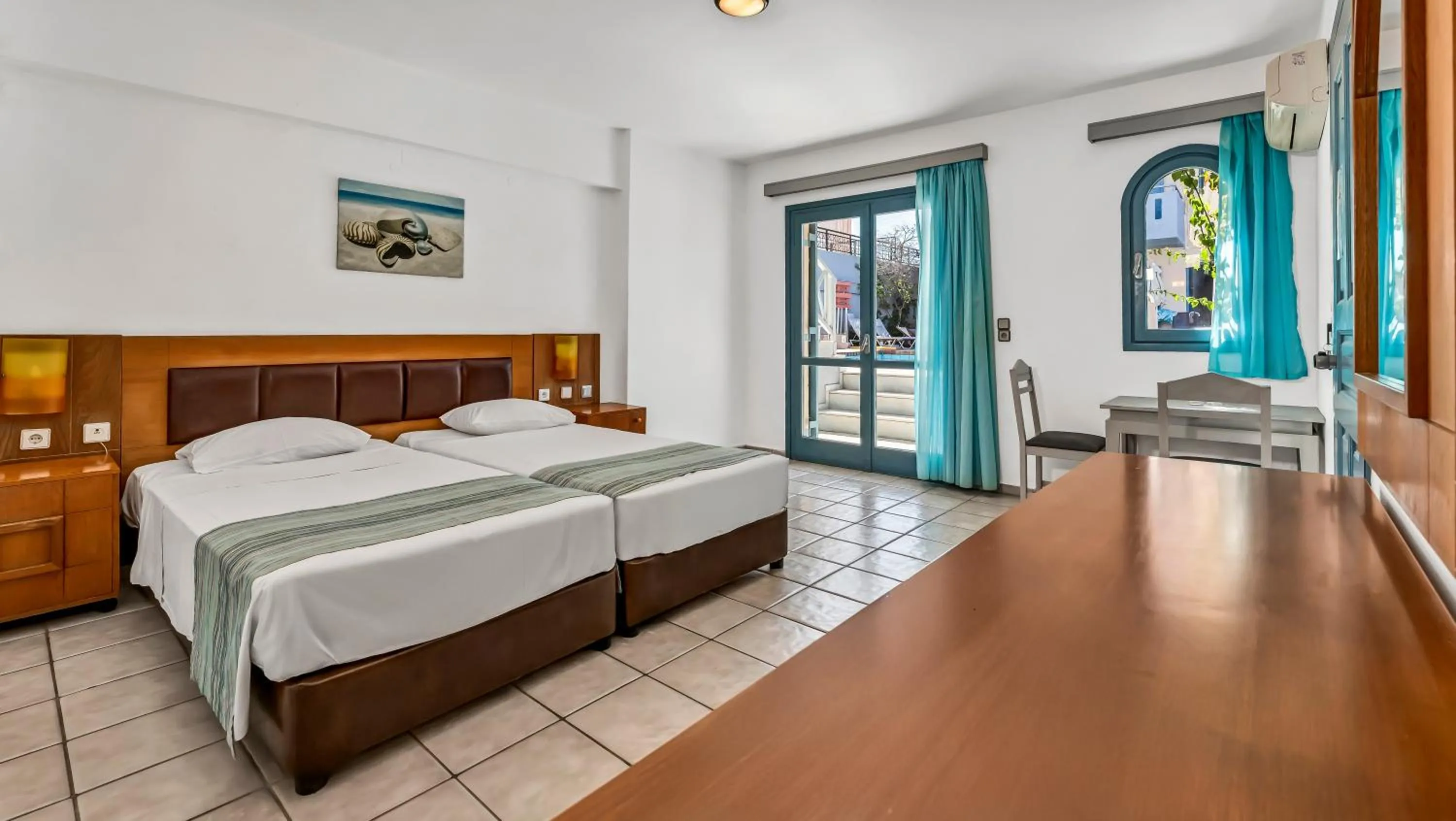 Bed in Marilisa Hotel