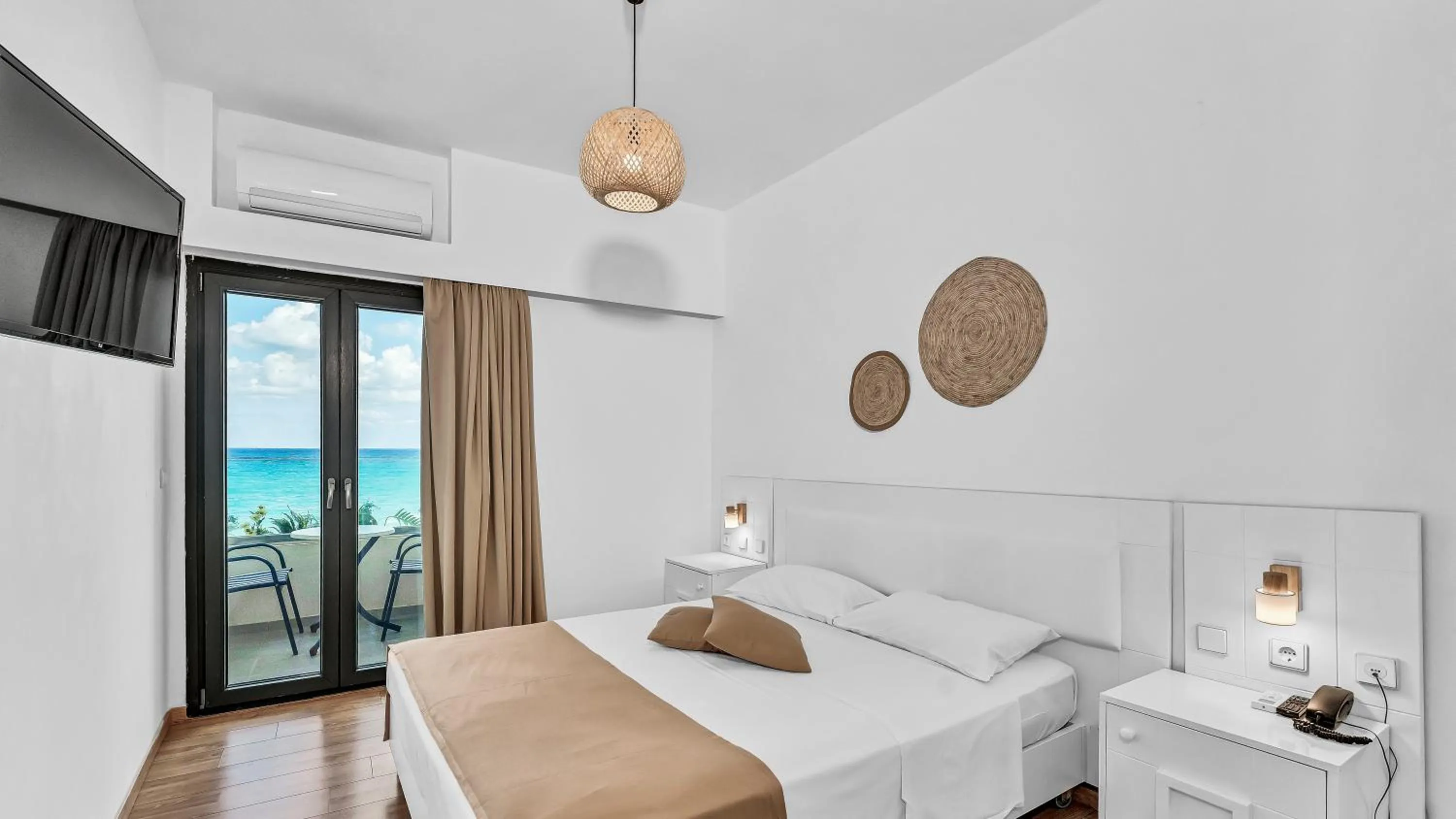 Bed in Sunset Beach Hotel