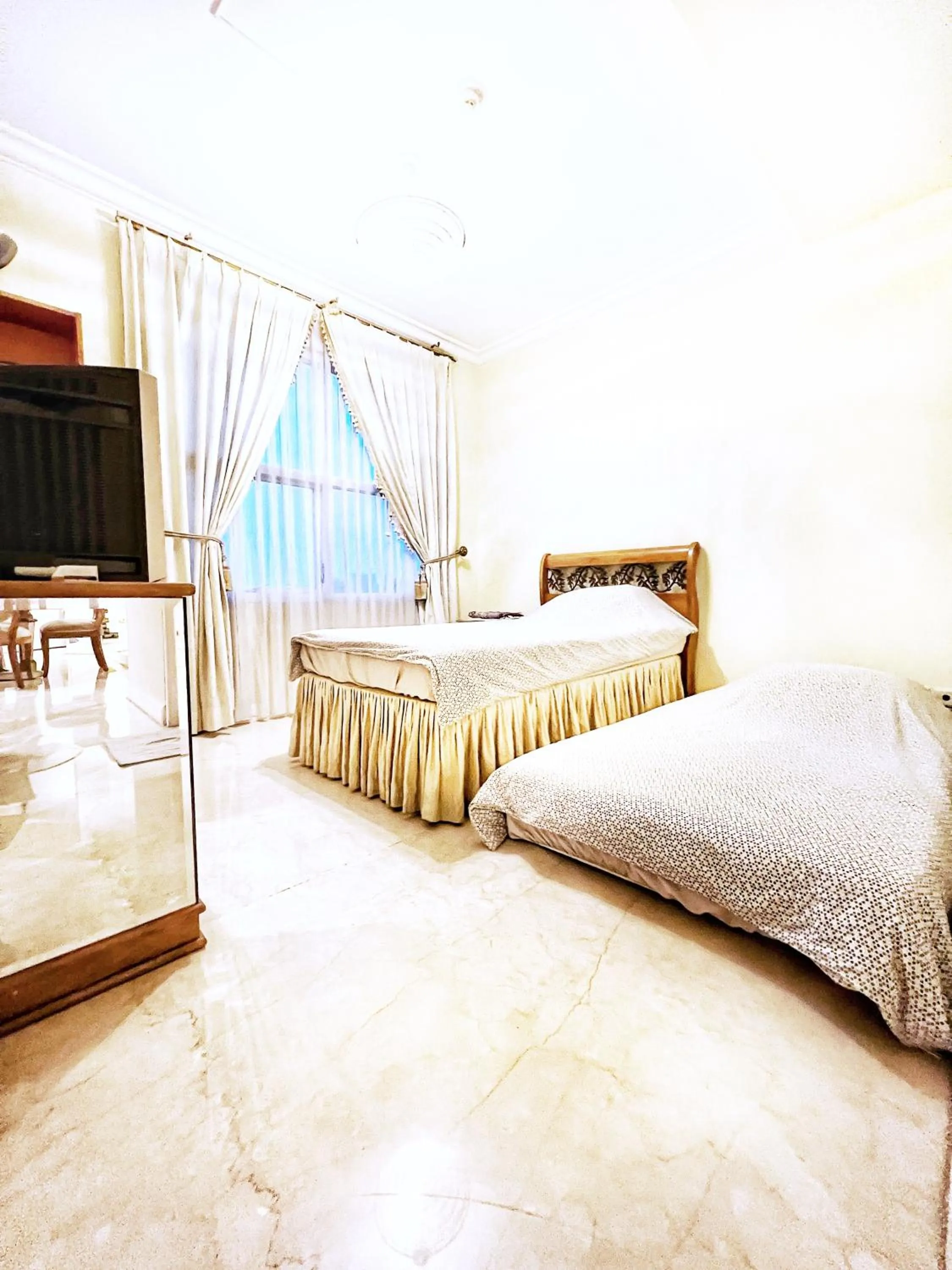 Bed in Batavia Apartment ST