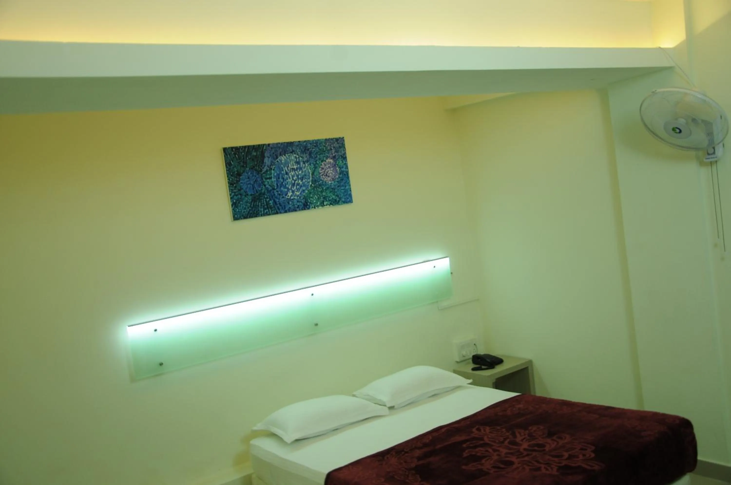 Bedroom in Cinnamon Residency