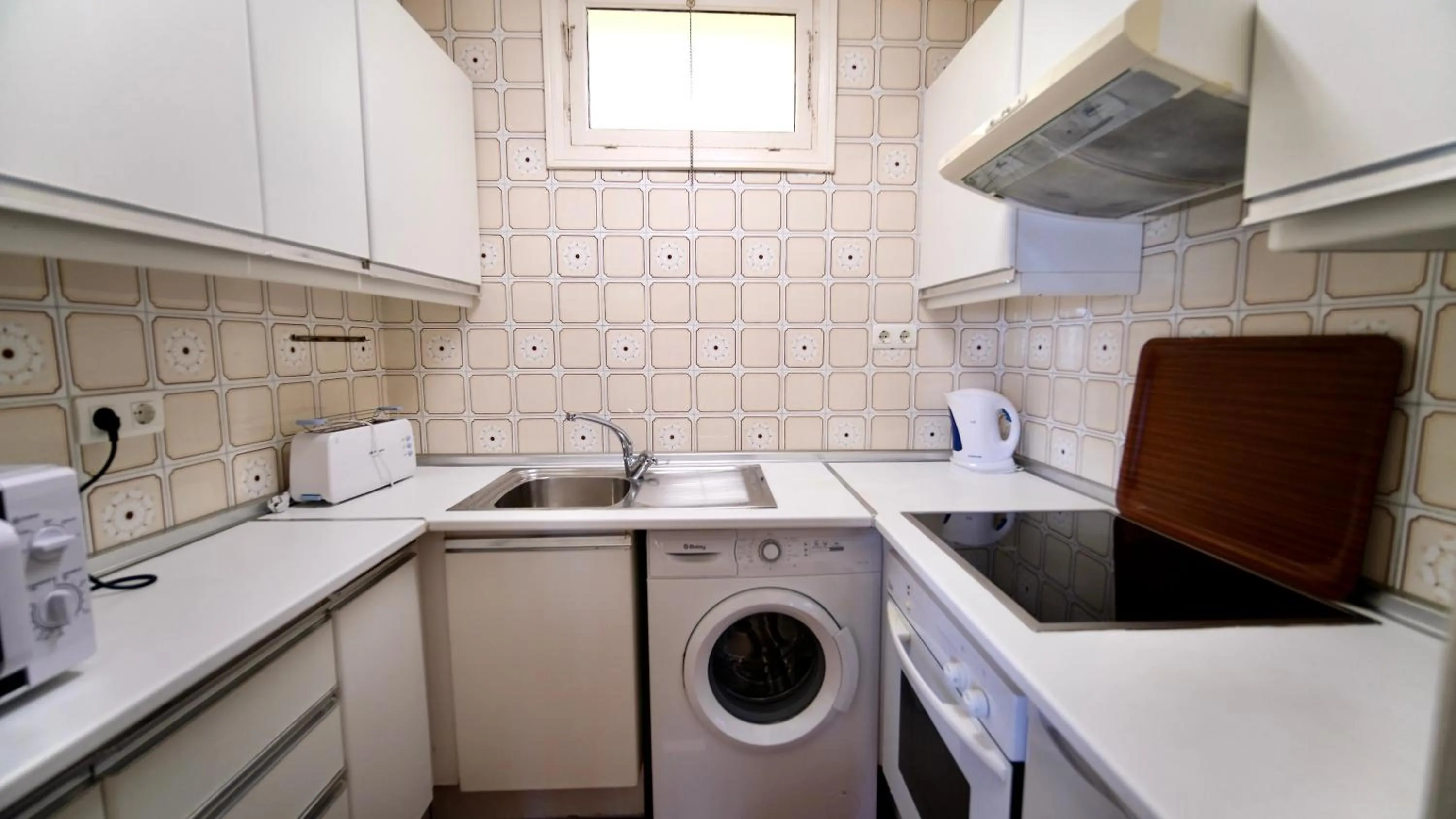 Kitchen or kitchenette in Apartamentos Coronado