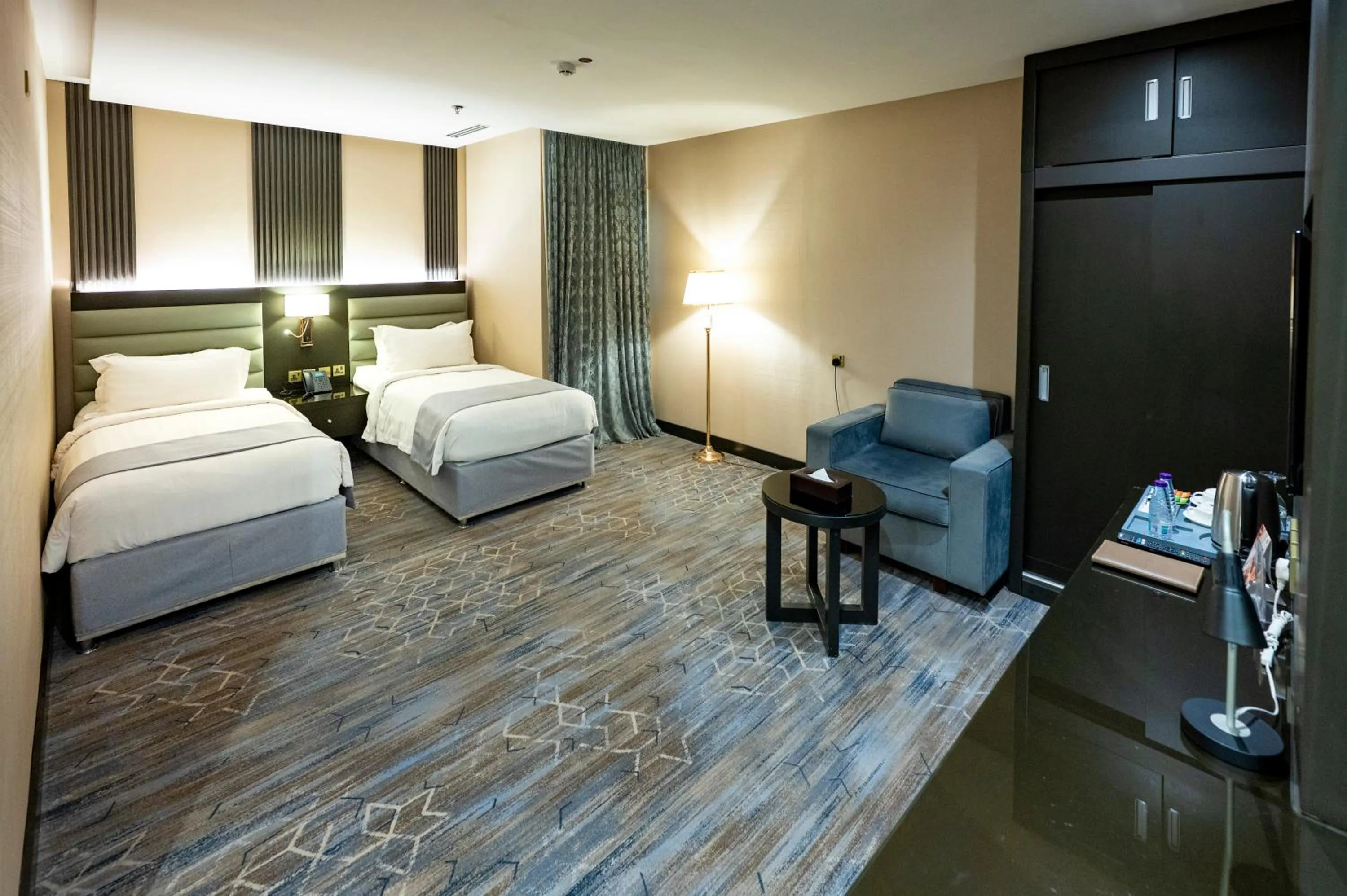 Bed in Sama Inn Hotel