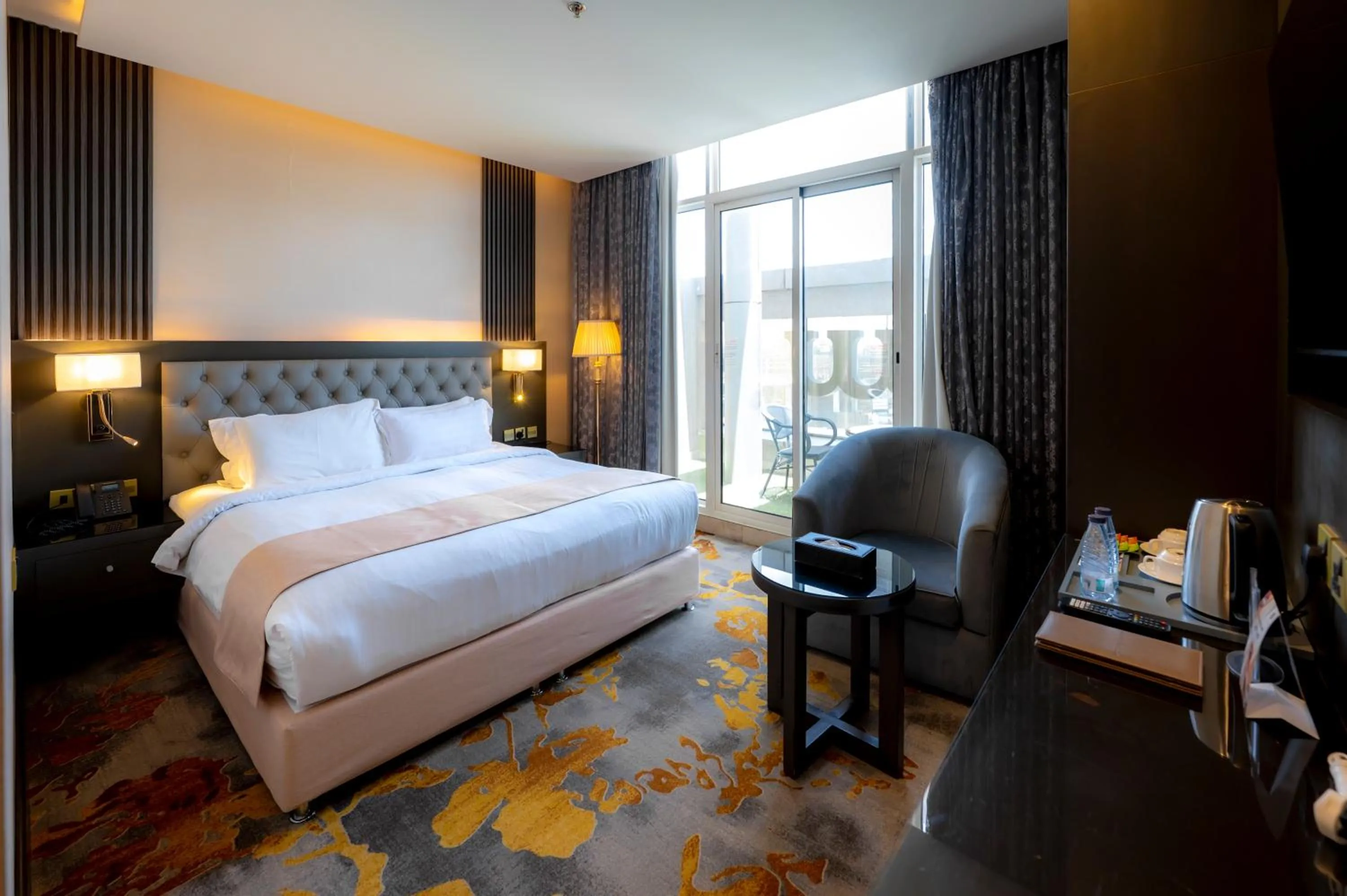 Bed in Sama Inn Hotel