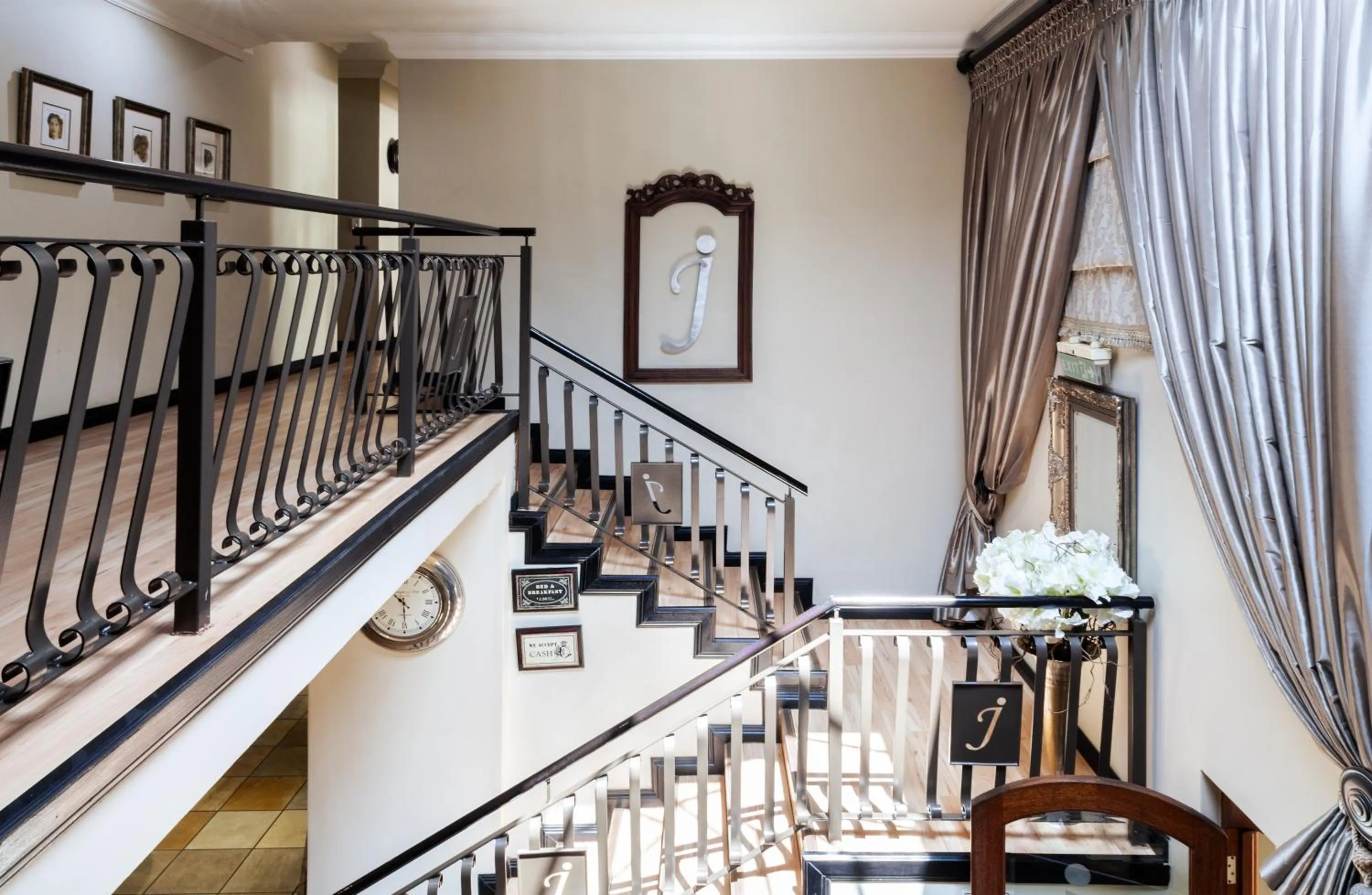 Lobby or reception in InnJoy Boutique Hotel