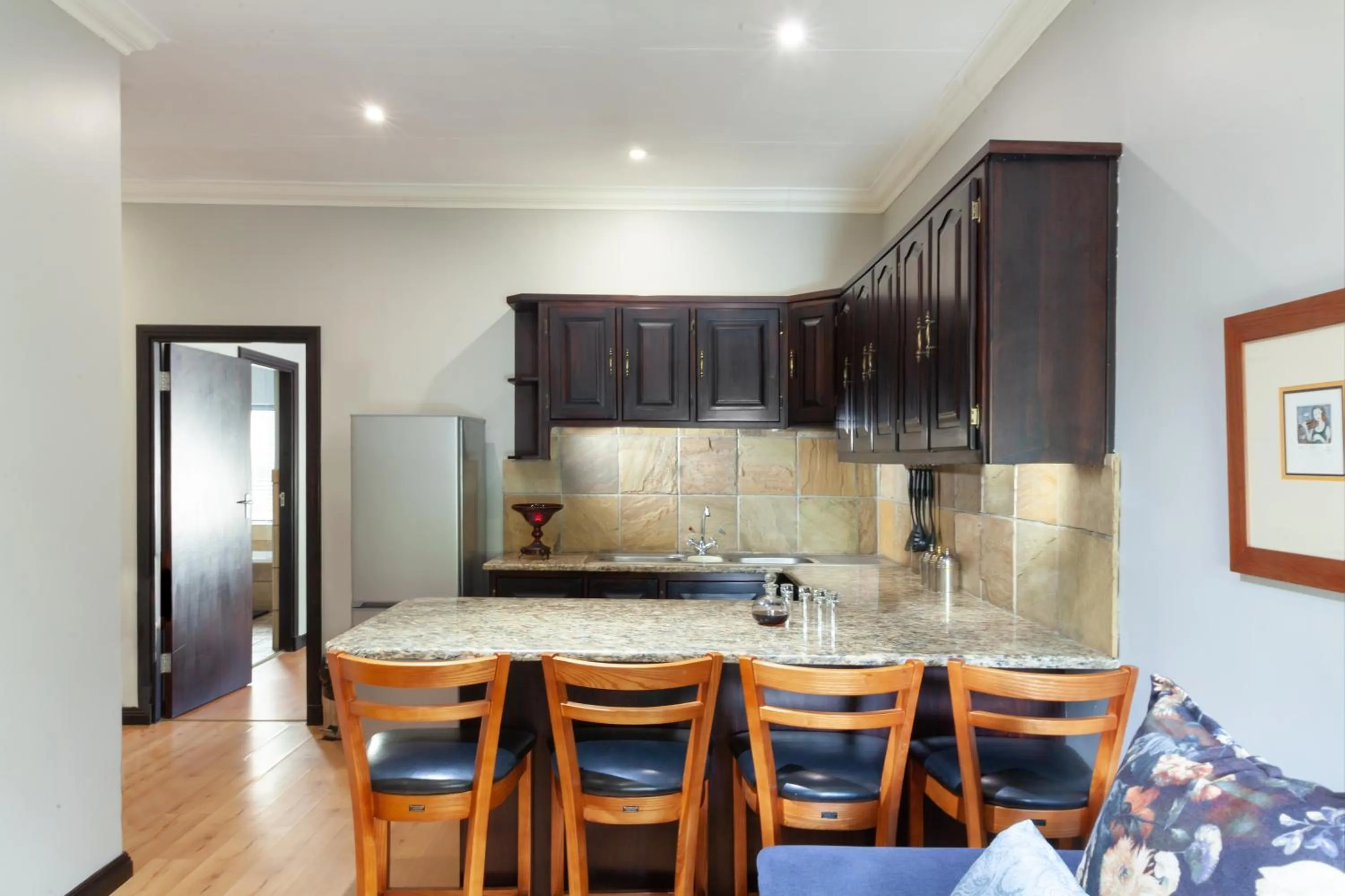 Kitchen or kitchenette in InnJoy Boutique Hotel