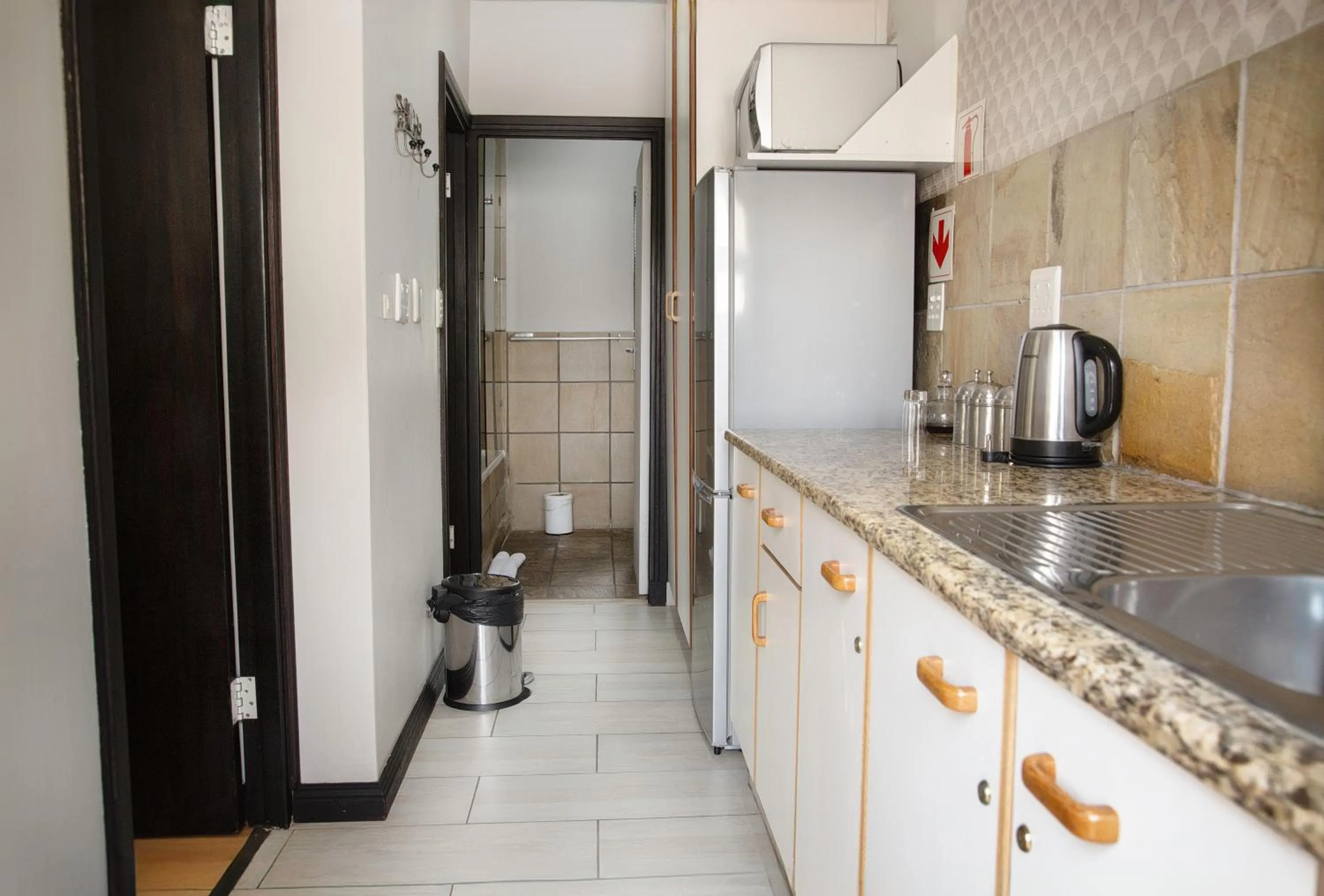 Kitchen or kitchenette in InnJoy Boutique Hotel