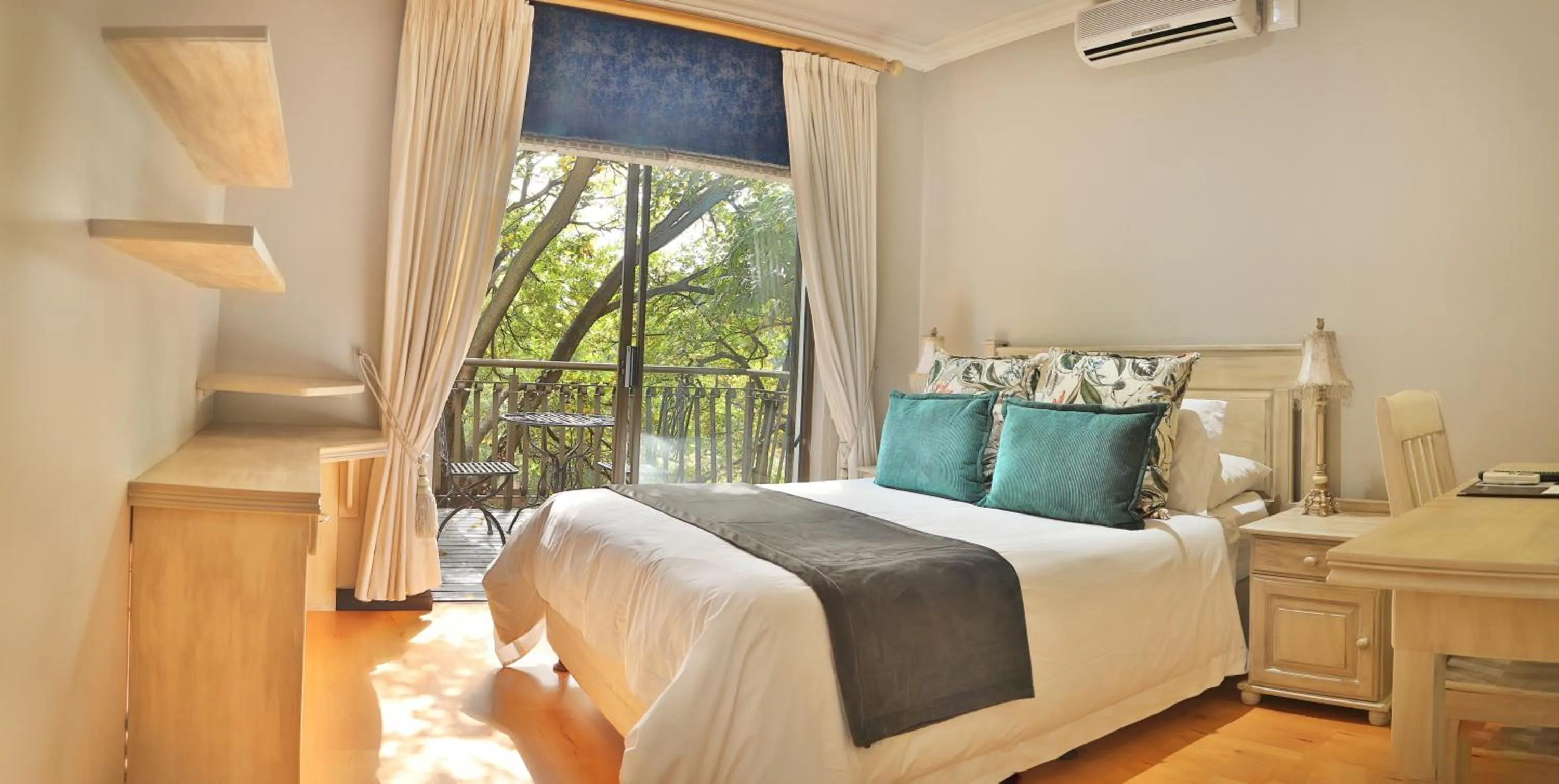 Photo of the whole room, Bed in InnJoy Boutique Hotel