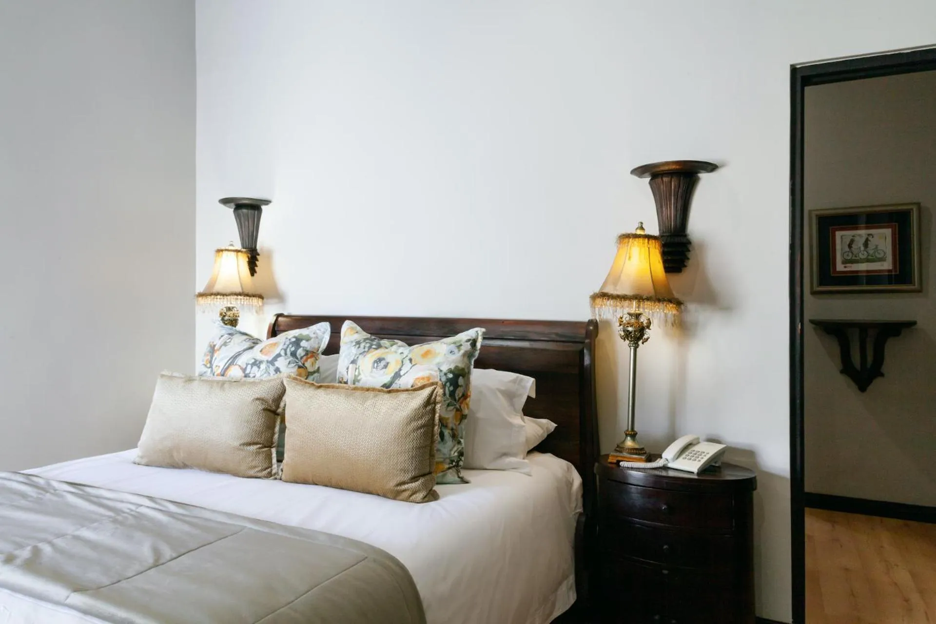 Bed in InnJoy Boutique Hotel