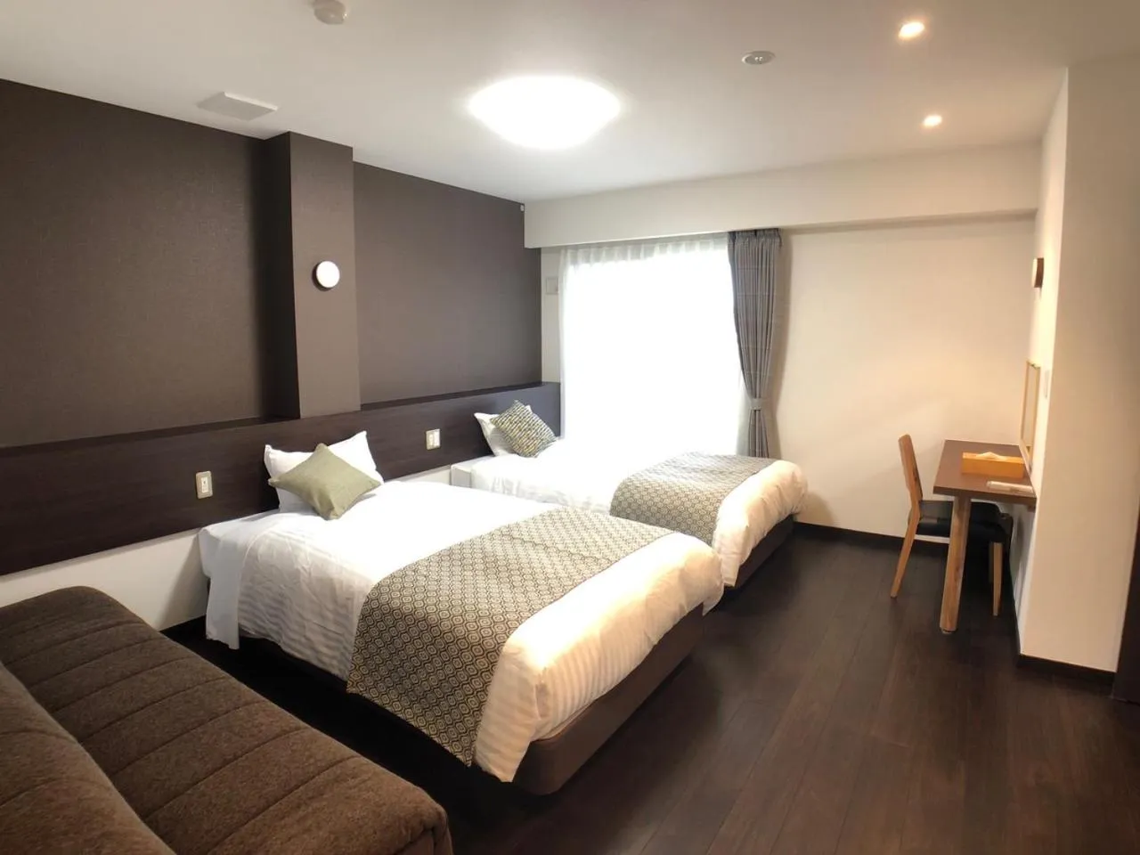 Bed in Kawaguchiko Urban Resort Villa