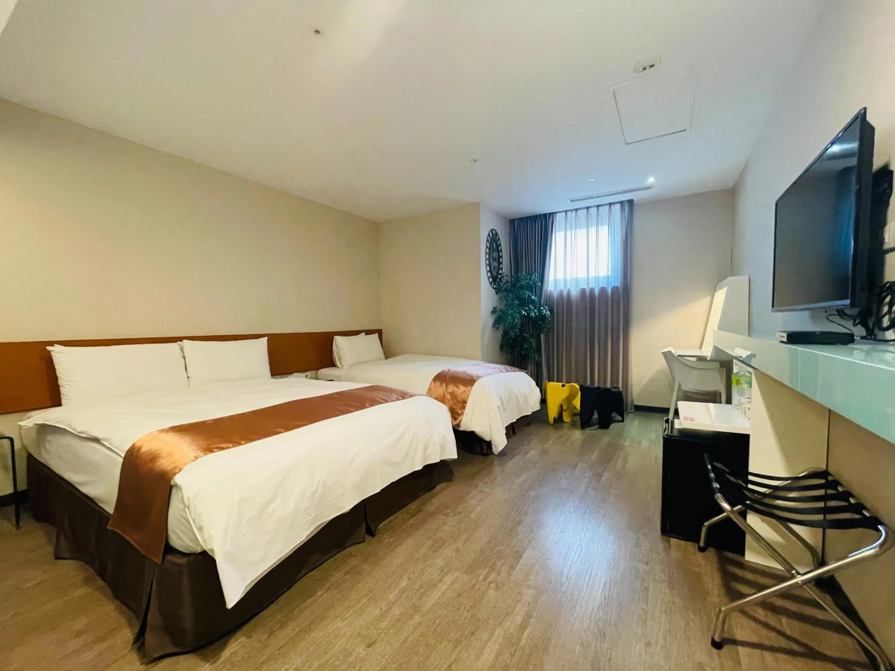 Bed in Travel Art Inn