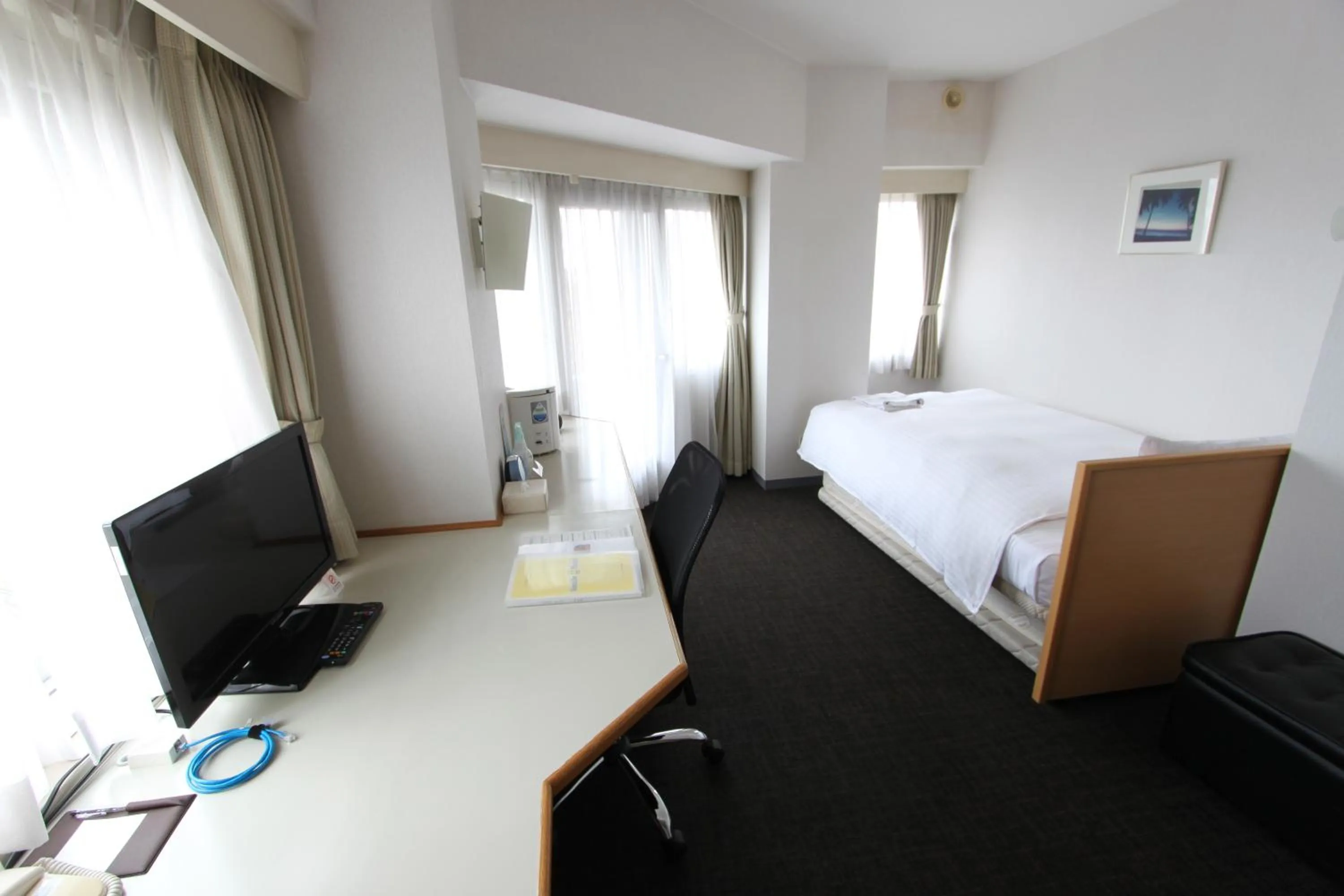 Photo of the whole room, TV/Entertainment Center in Smile Hotel Tokyo-Tamanagayama