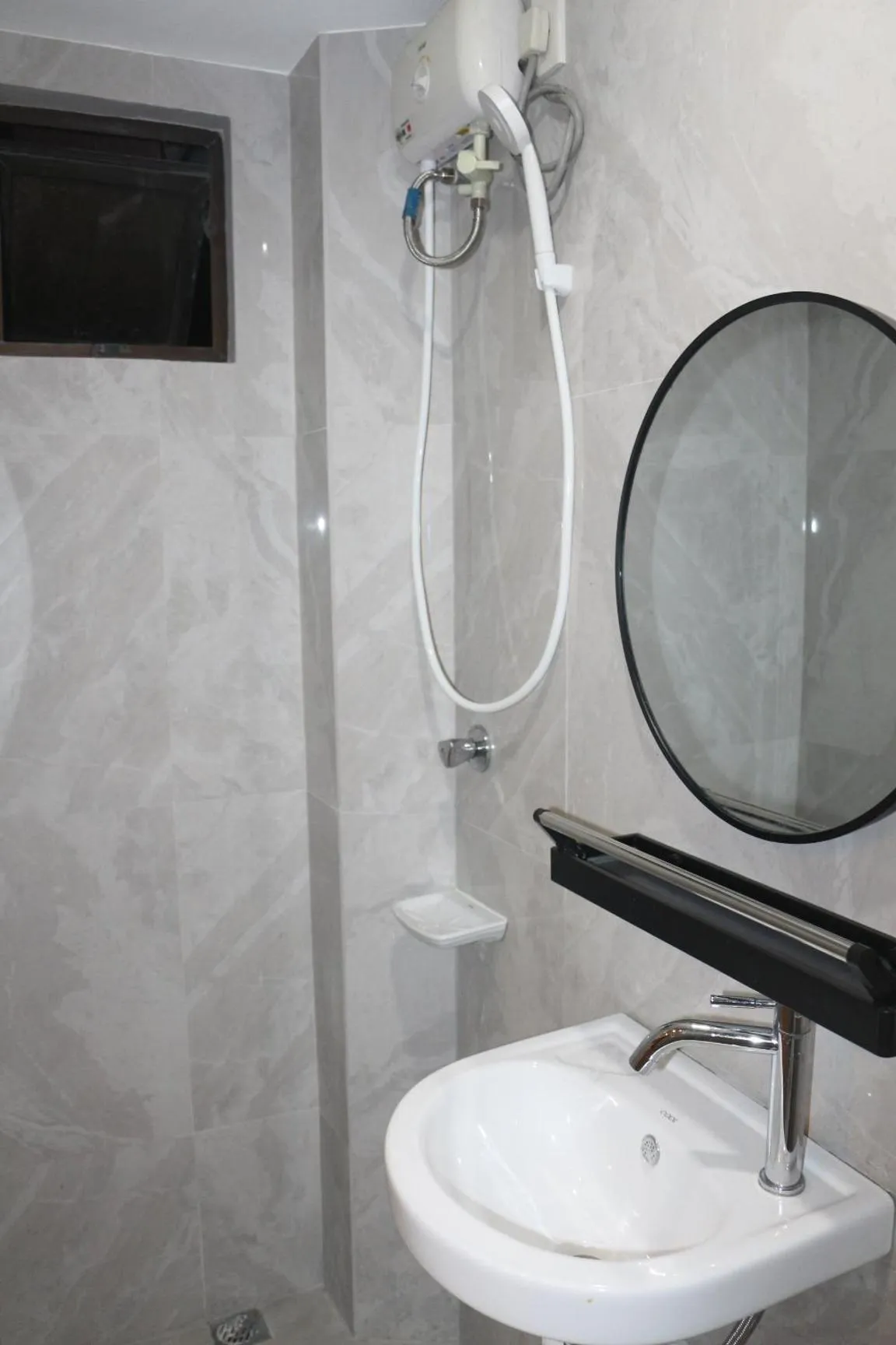 Bathroom in Stone House Hotel Manila