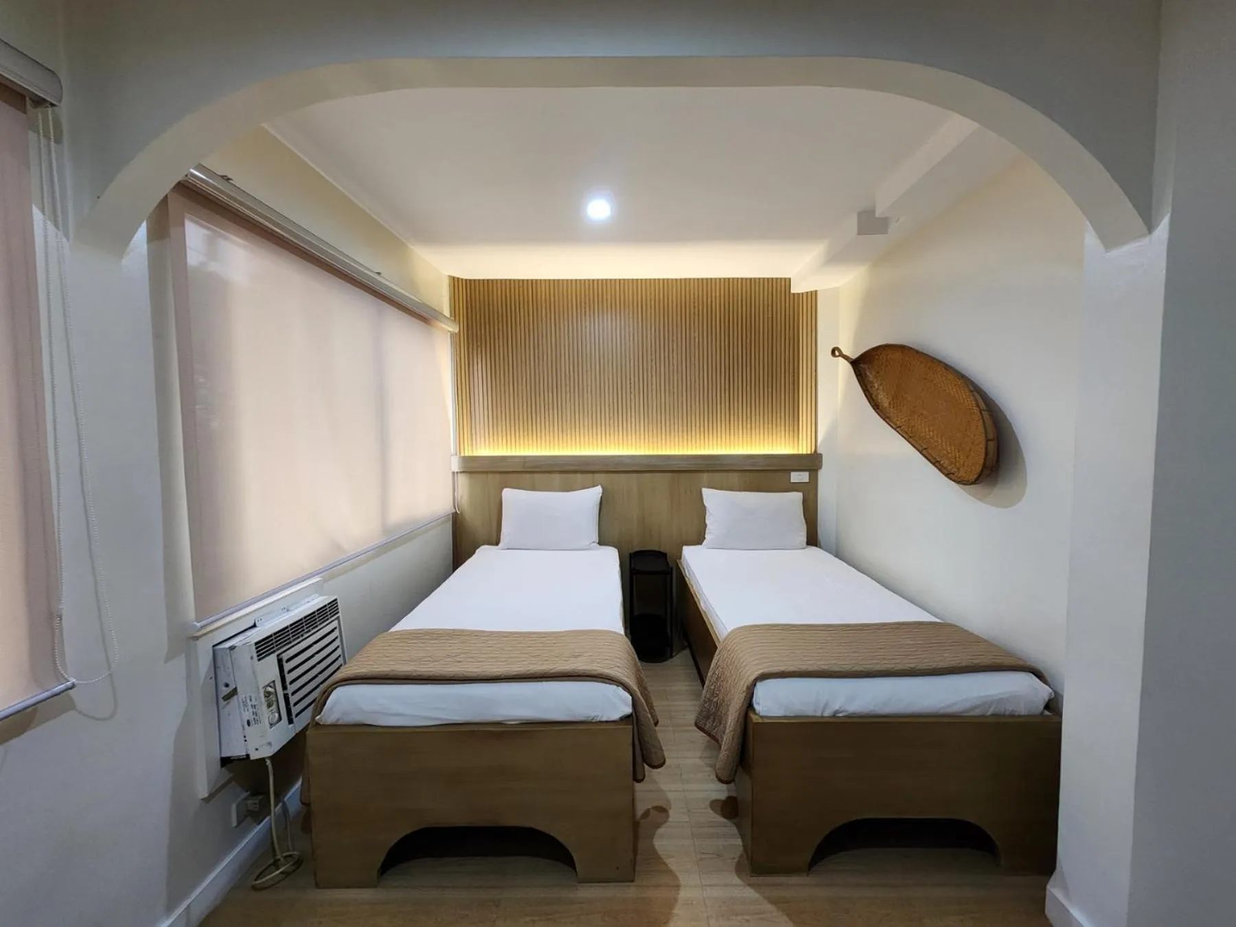 Bed in Stone House Hotel Manila