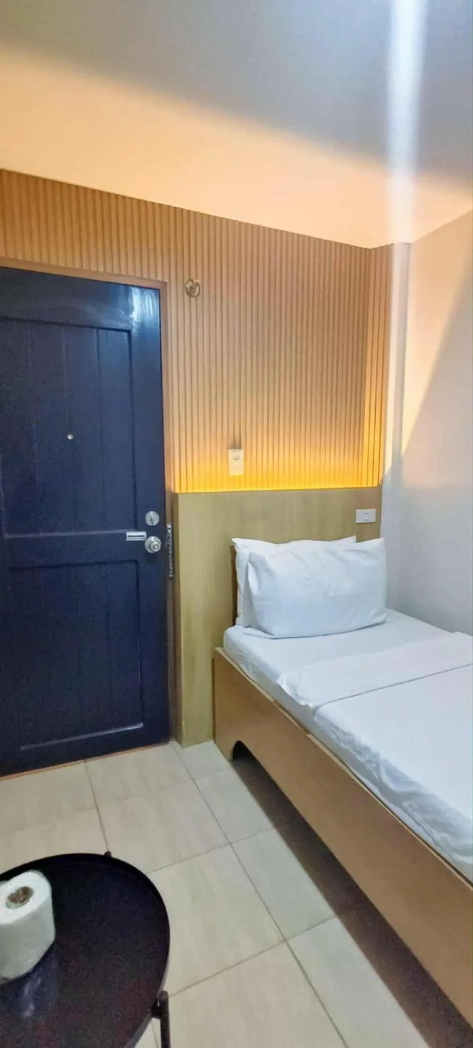 Bed in Stone House Hotel Manila