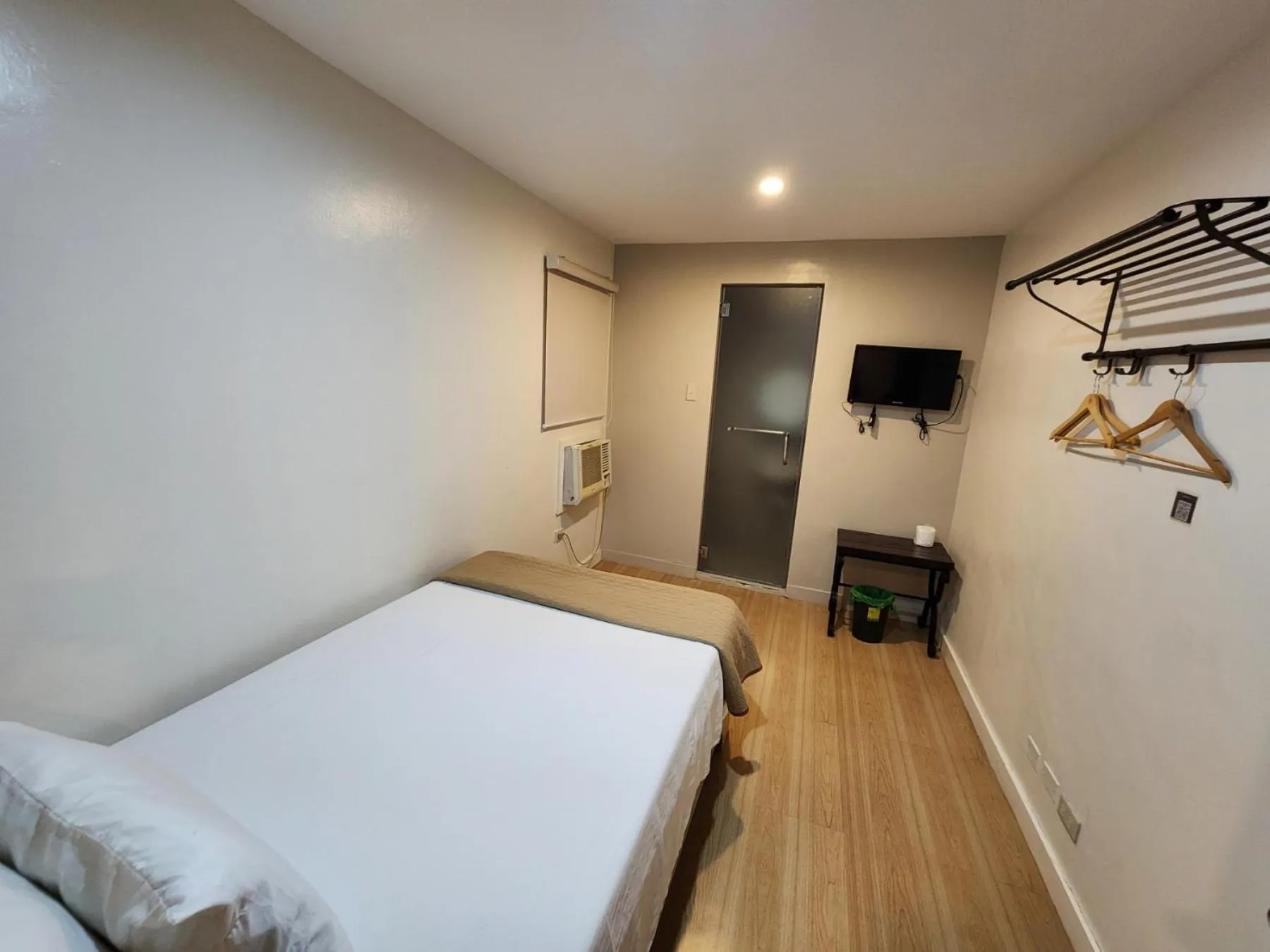 Bed in Stone House Hotel Manila