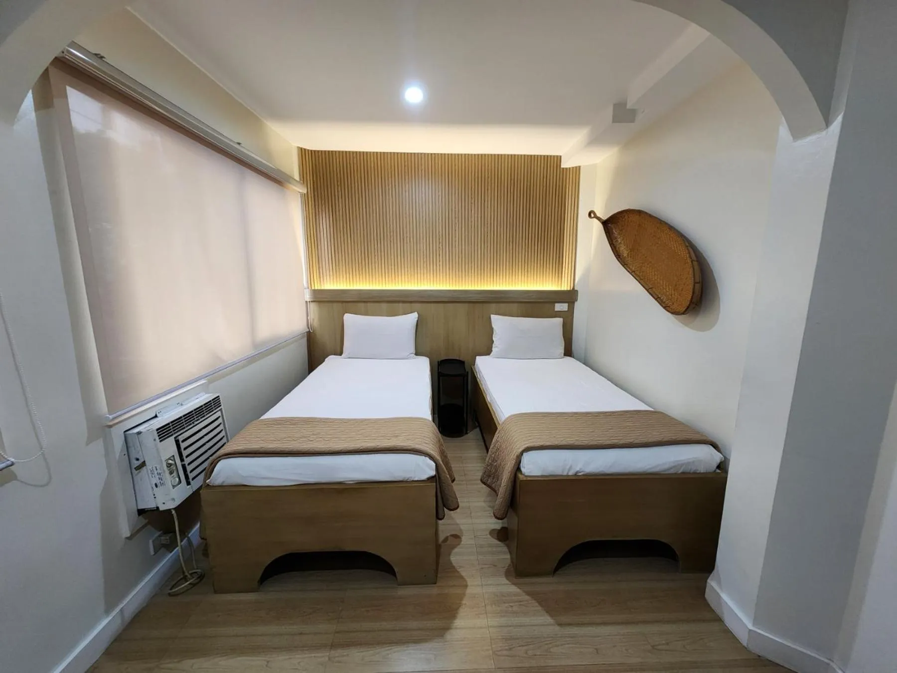 Bed in Stone House Hotel Manila