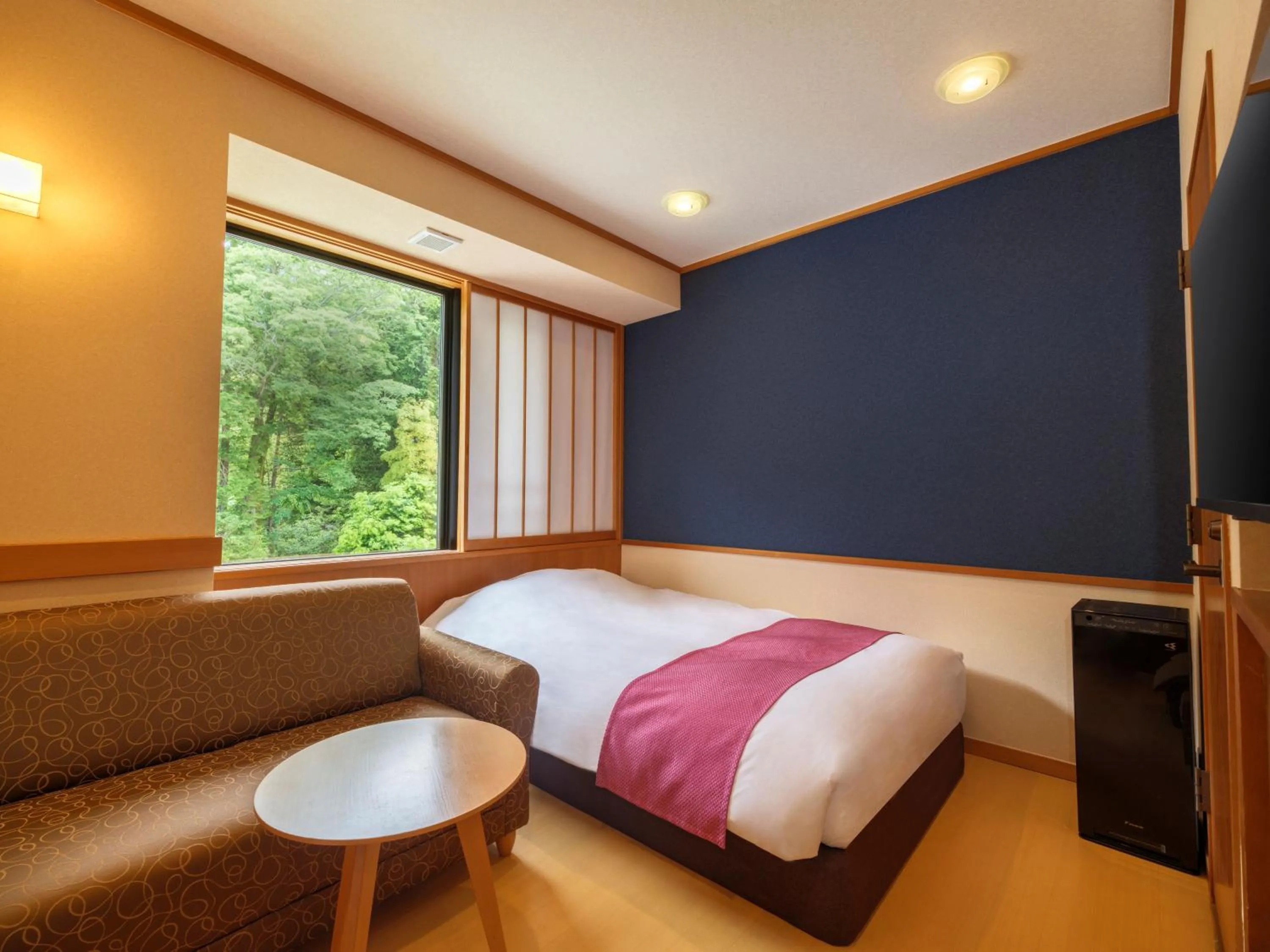 Photo of the whole room, Bed in Mizunoto Reopening on April 1, 2025