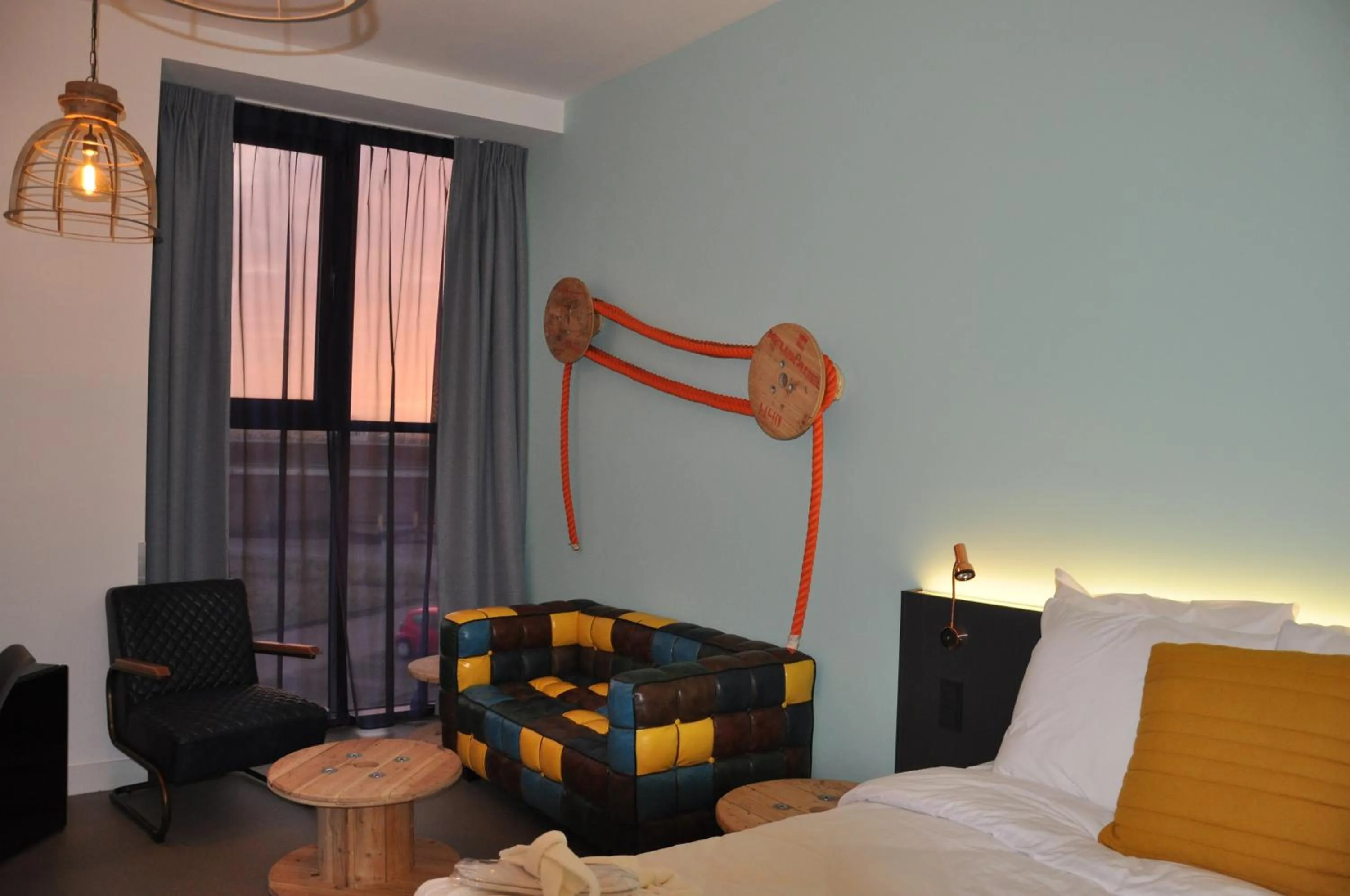 Living room, Bed in Hotel Rauw aan de Kade