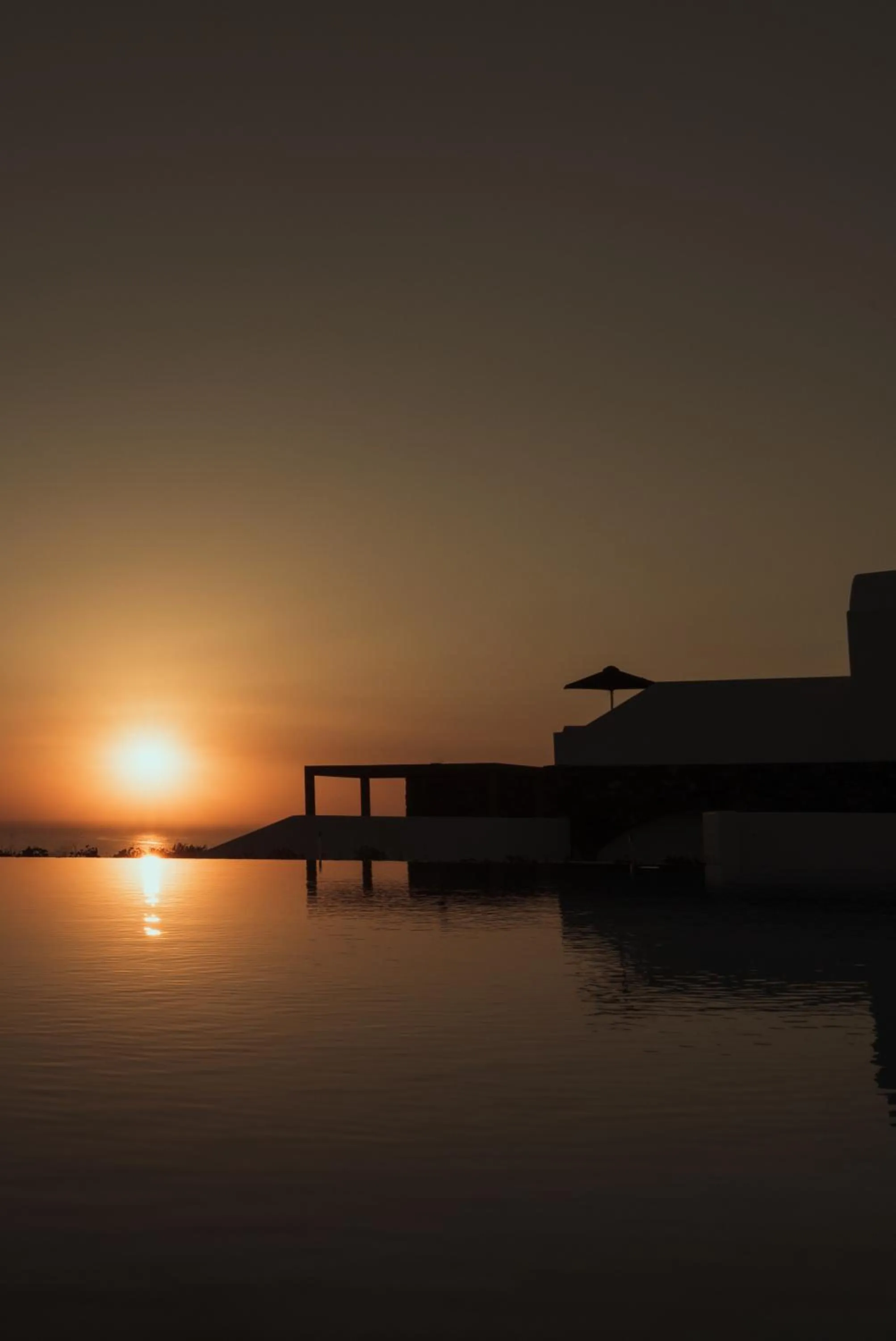 Sunset in Santo Pure Oia Suites & Villas