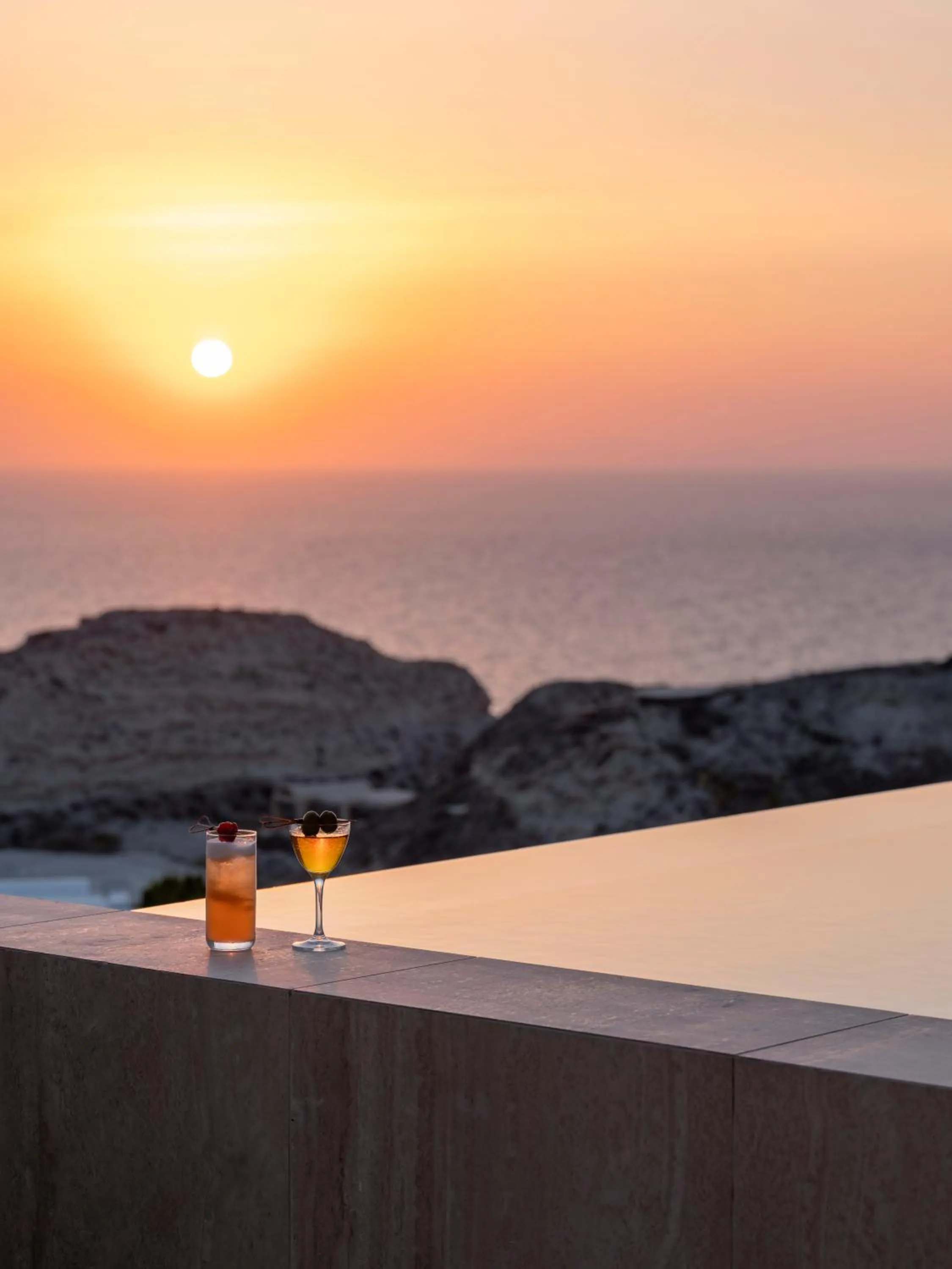 Sunset in Santo Pure Oia Suites & Villas