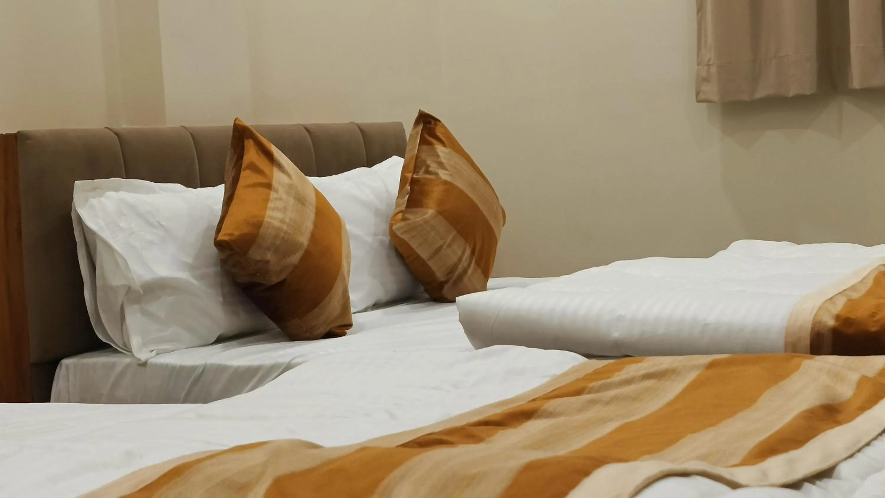 Bed in ShyamRaj Hotel