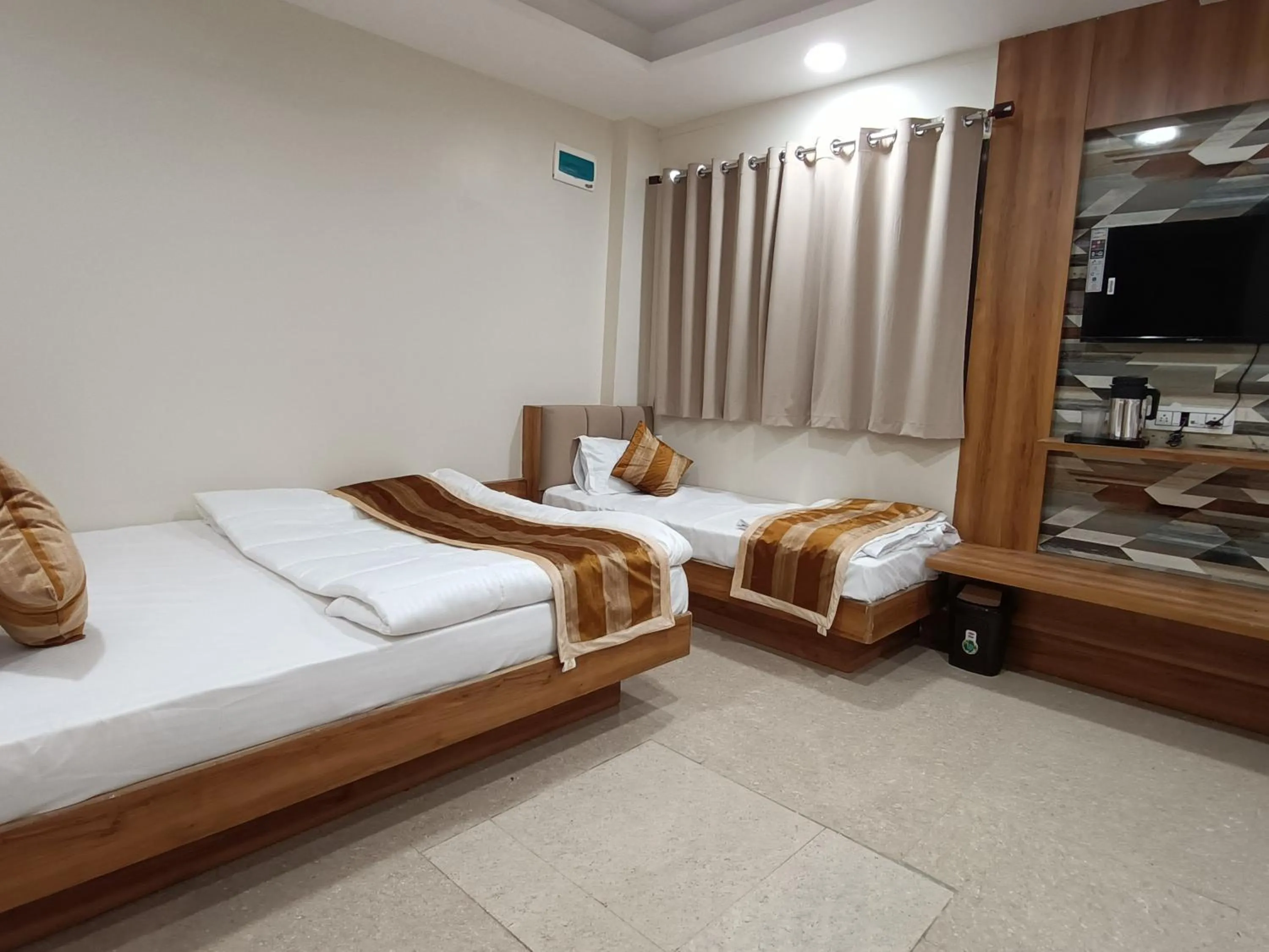 Bed in ShyamRaj Hotel