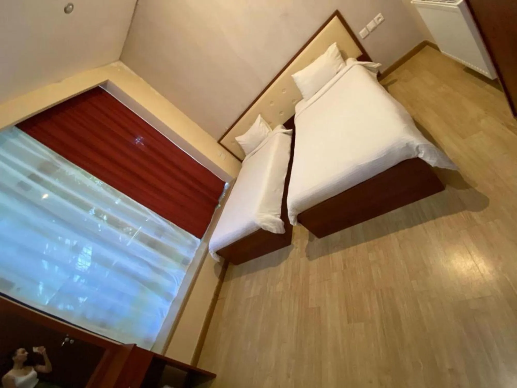 Bedroom in Villadzor Apart Hotel