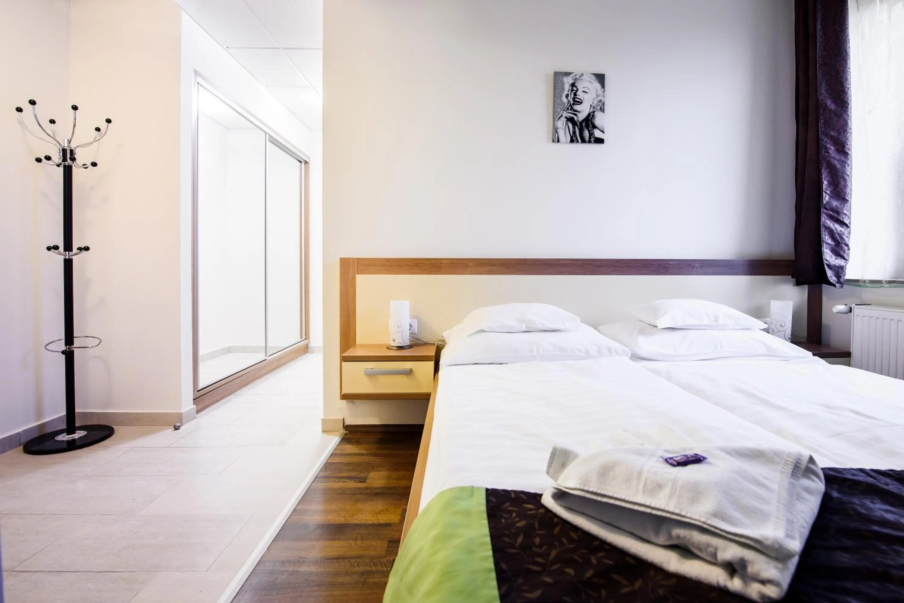 Bed in Hotel Garzon Plaza