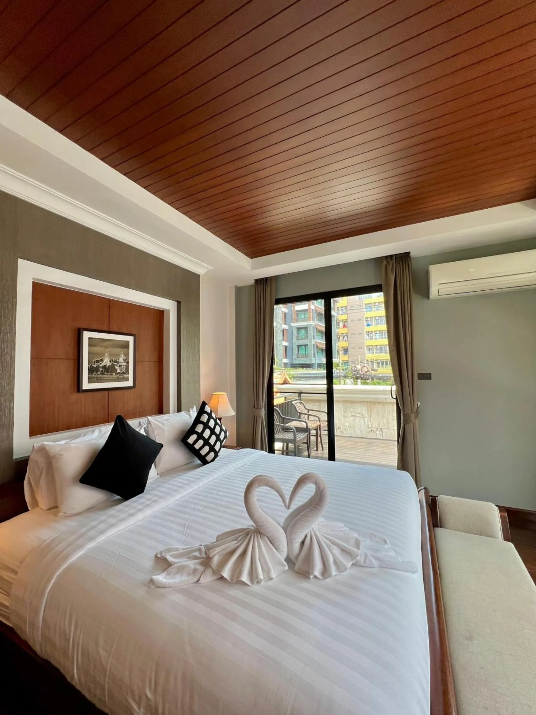 Bed in Yotaka Bangkok Hotel