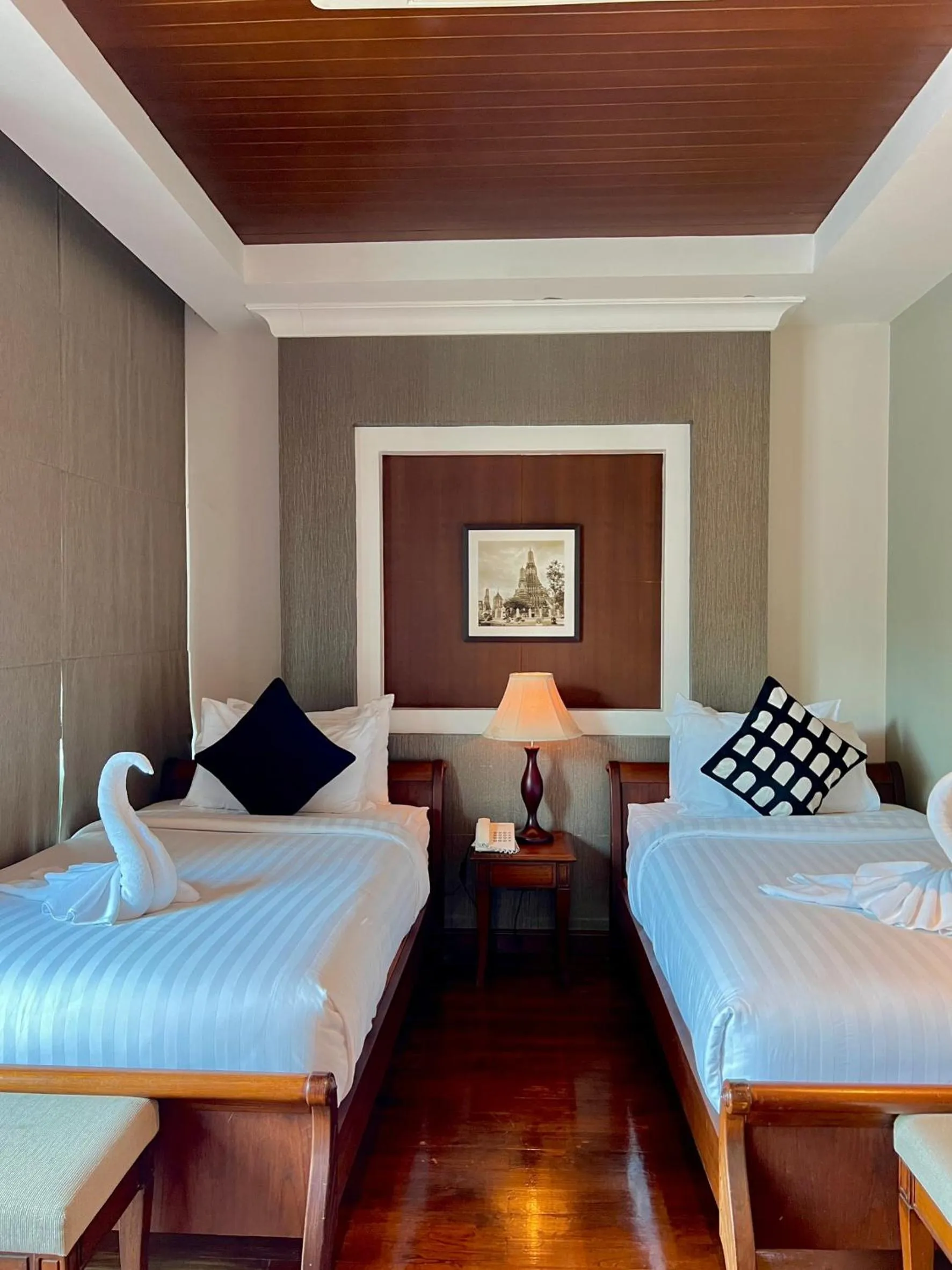 Bed in Yotaka Bangkok Hotel