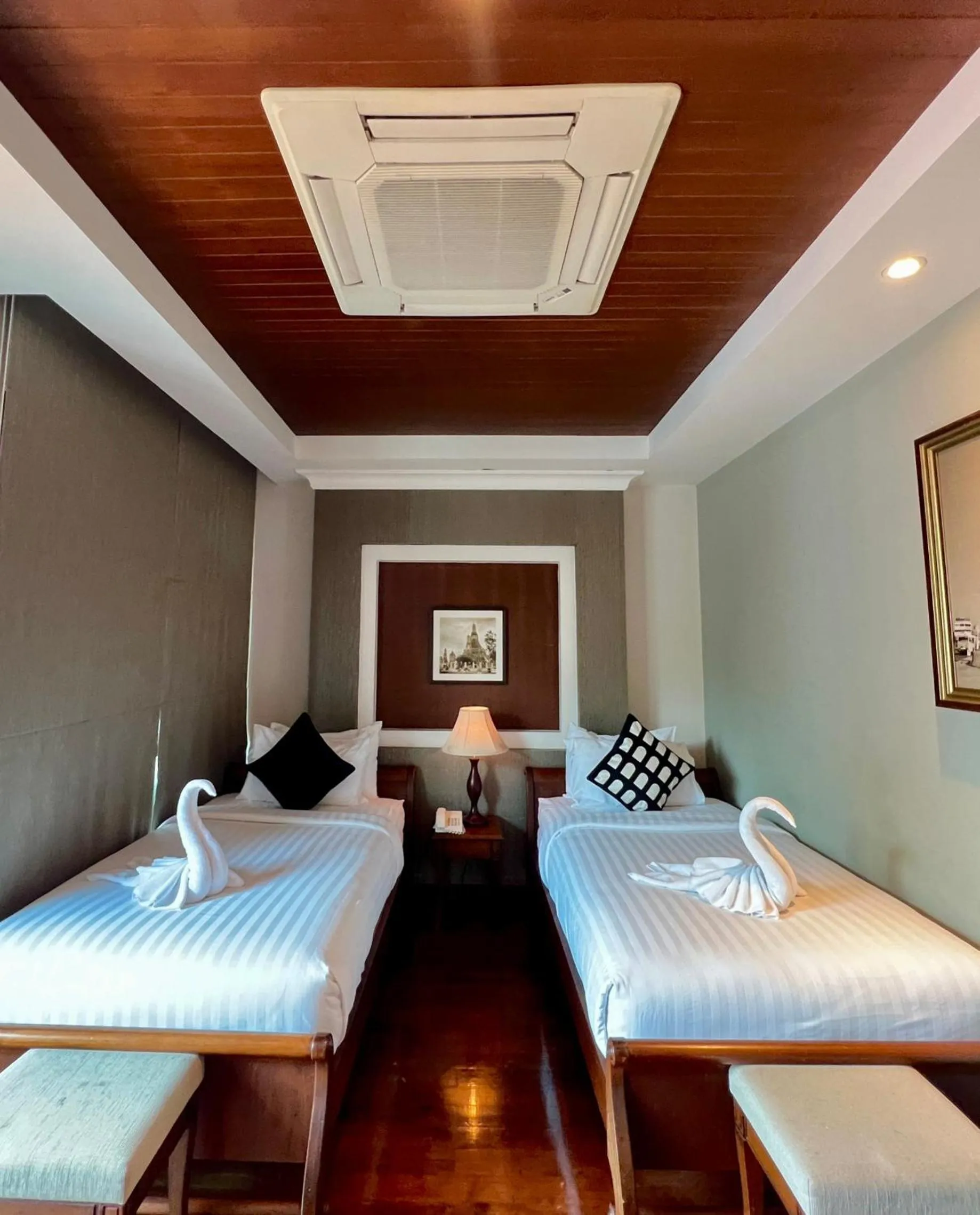 Bed in Yotaka Bangkok Hotel