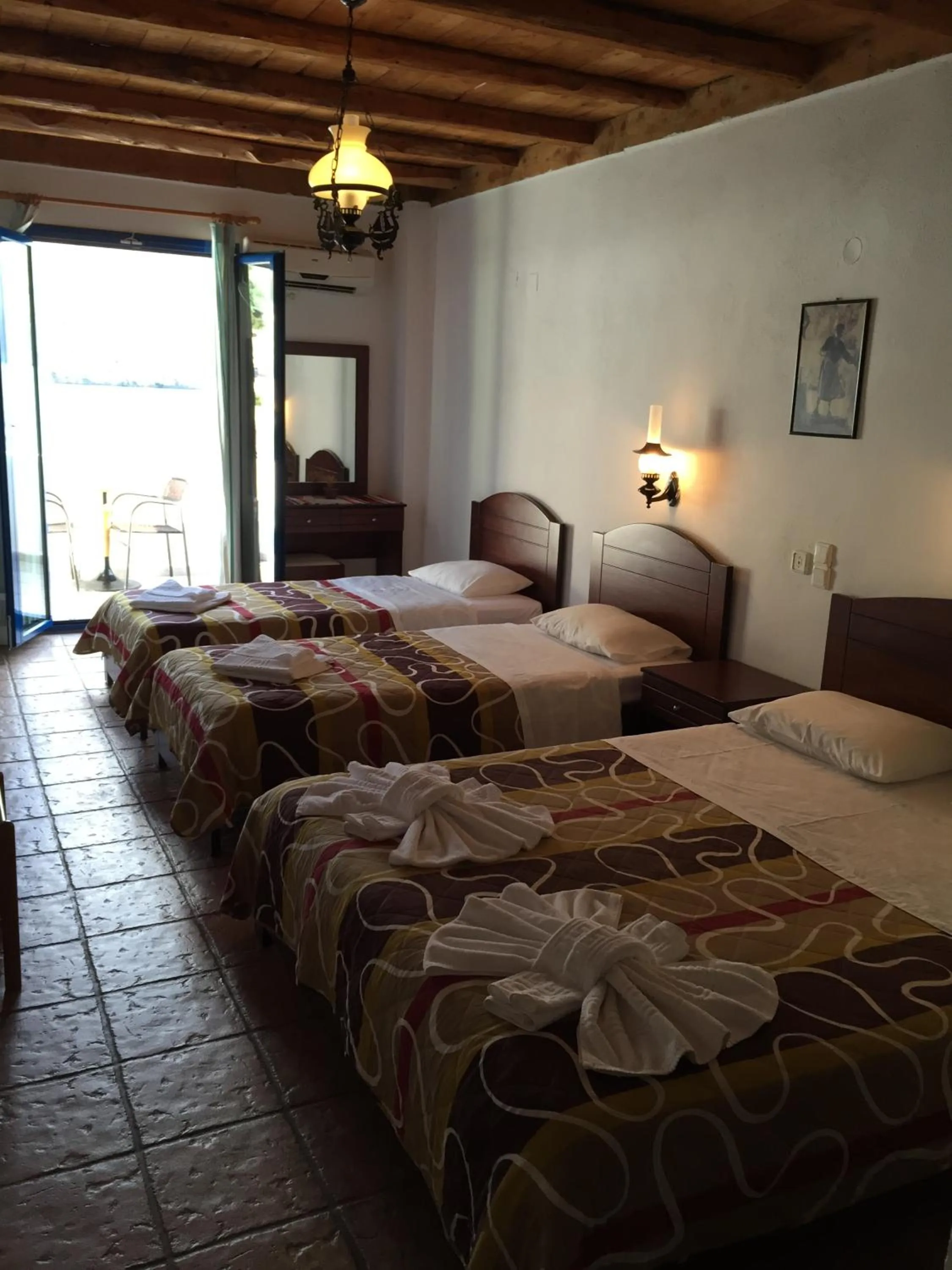 Balcony/Terrace, Bed in Daskalogiannis Hotel