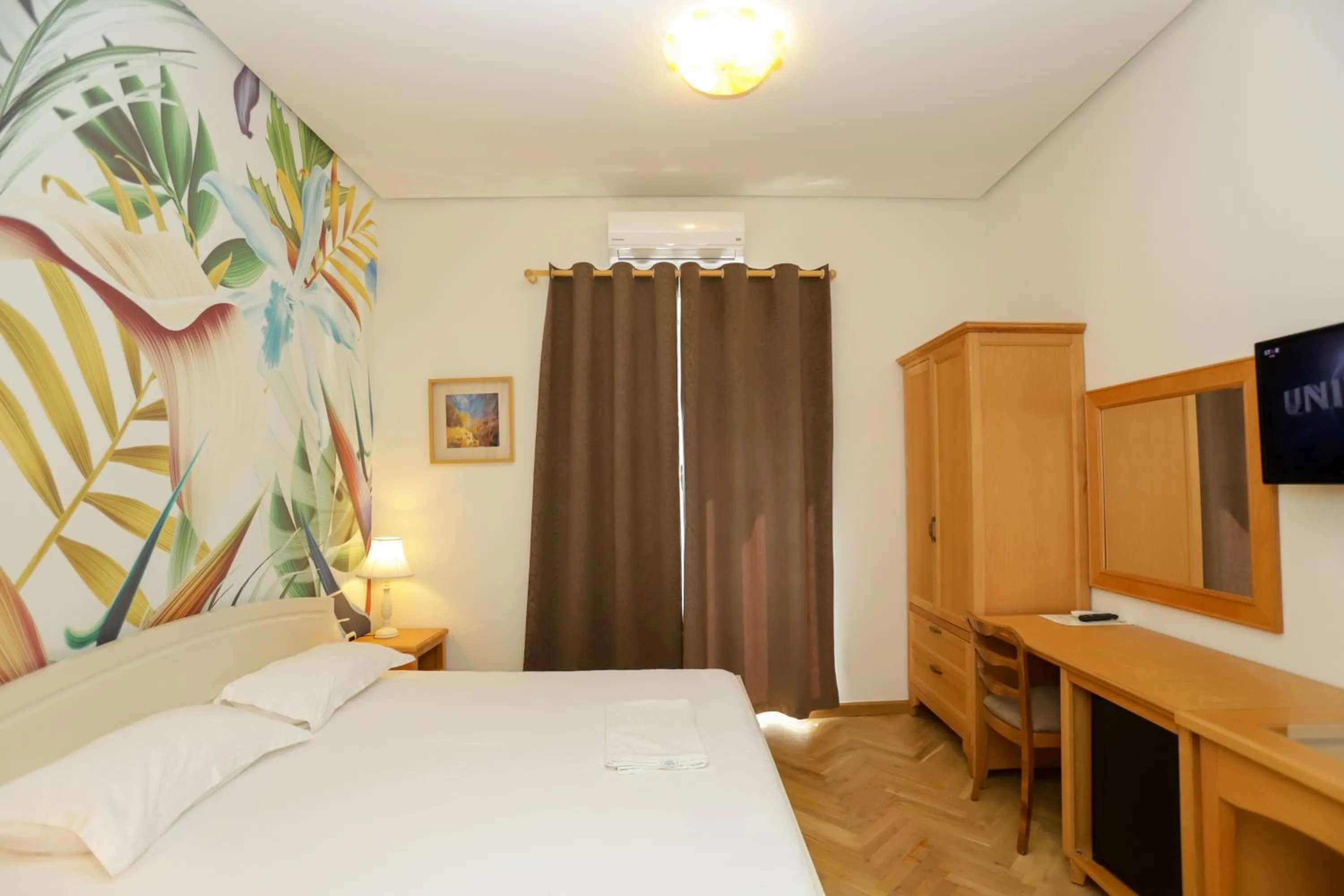 Bedroom in Le Palazzine Hotel