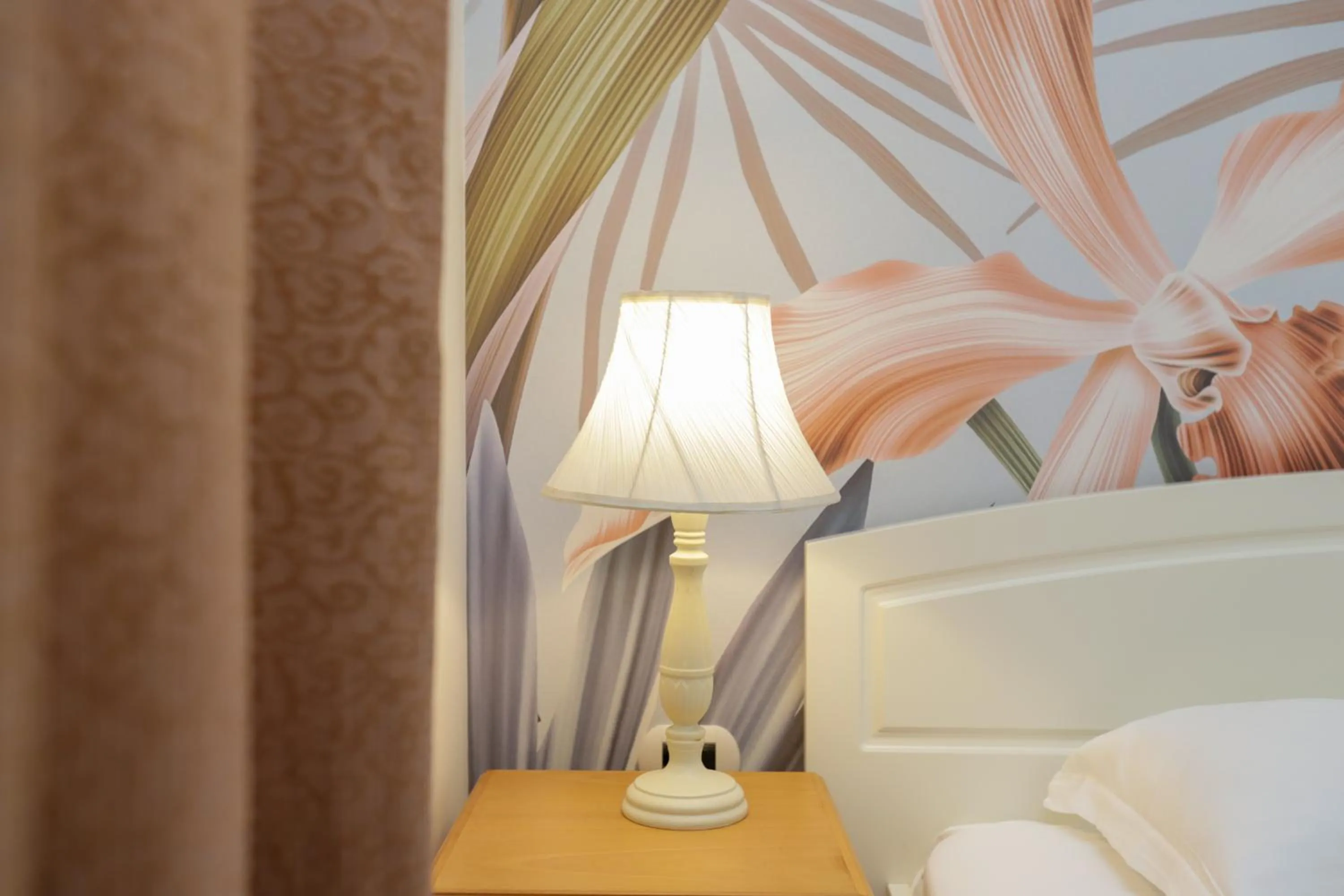 Bedroom in Le Palazzine Hotel