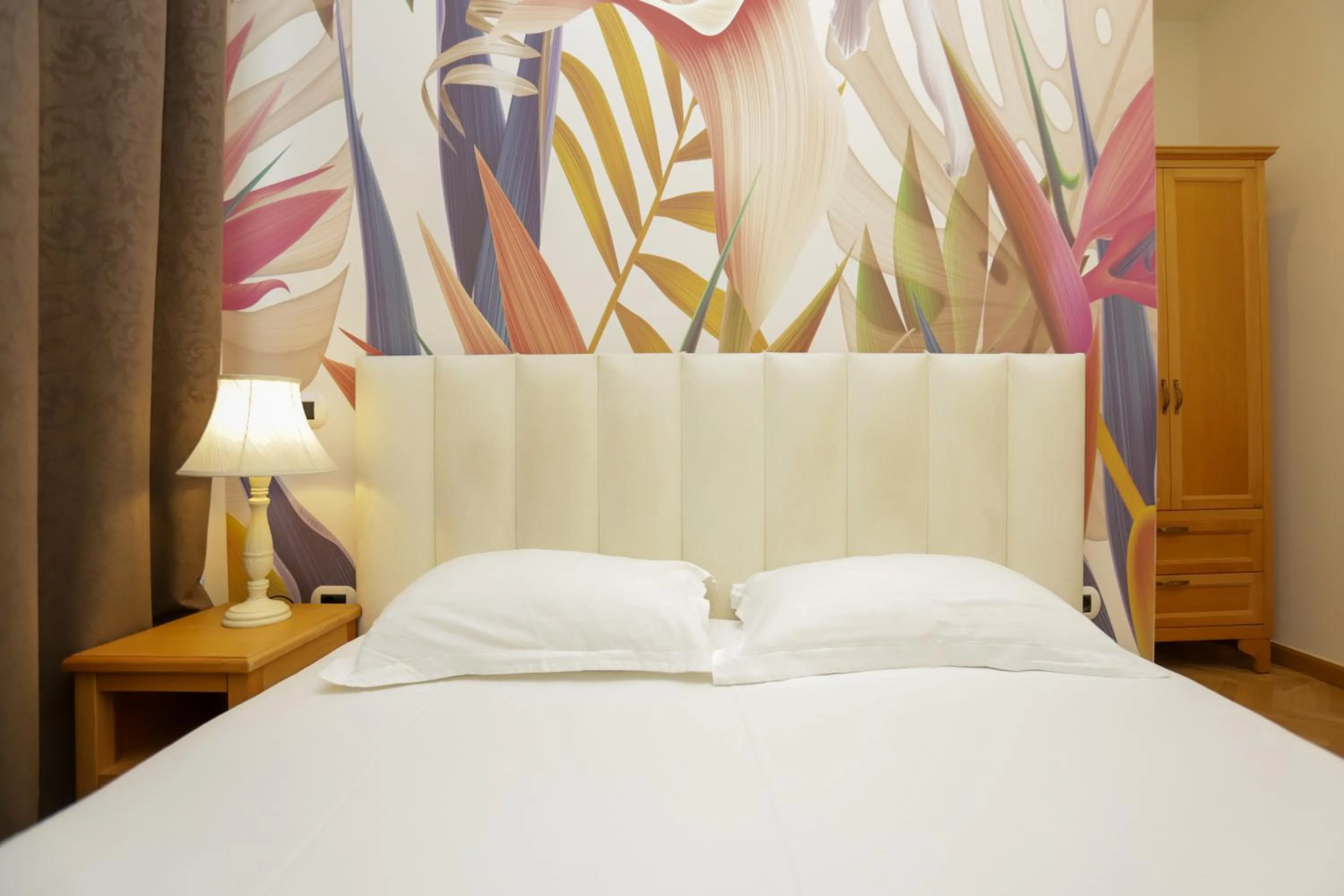 Bedroom in Le Palazzine Hotel