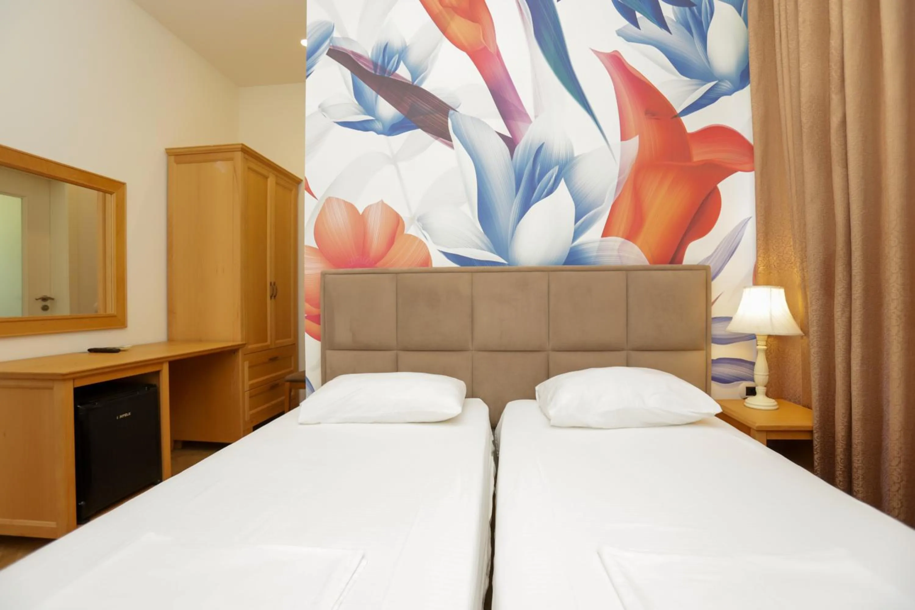 Bedroom in Le Palazzine Hotel