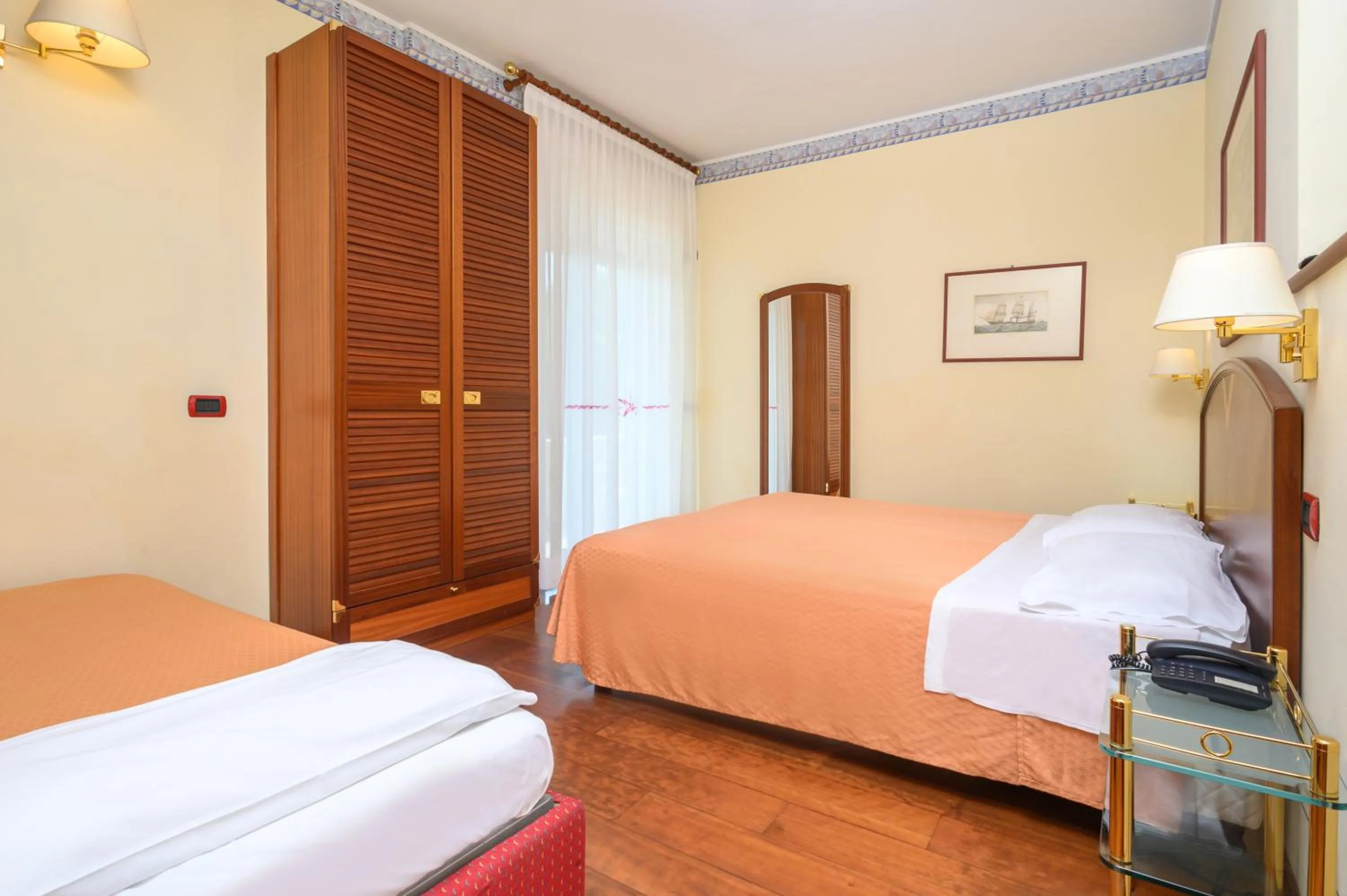 Bed in Atilius Hotel & Suites