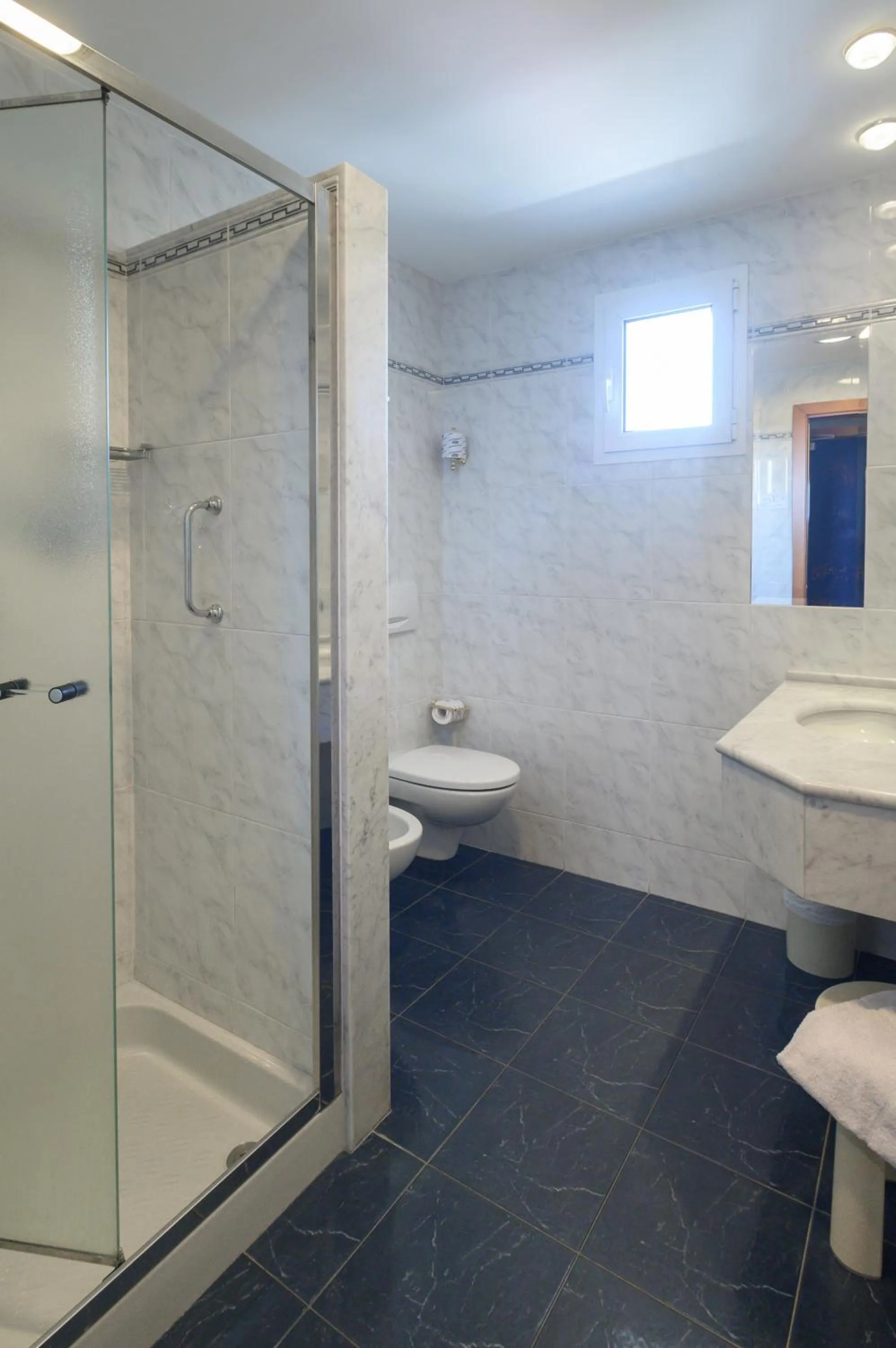 Bathroom in Atilius Hotel & Suites