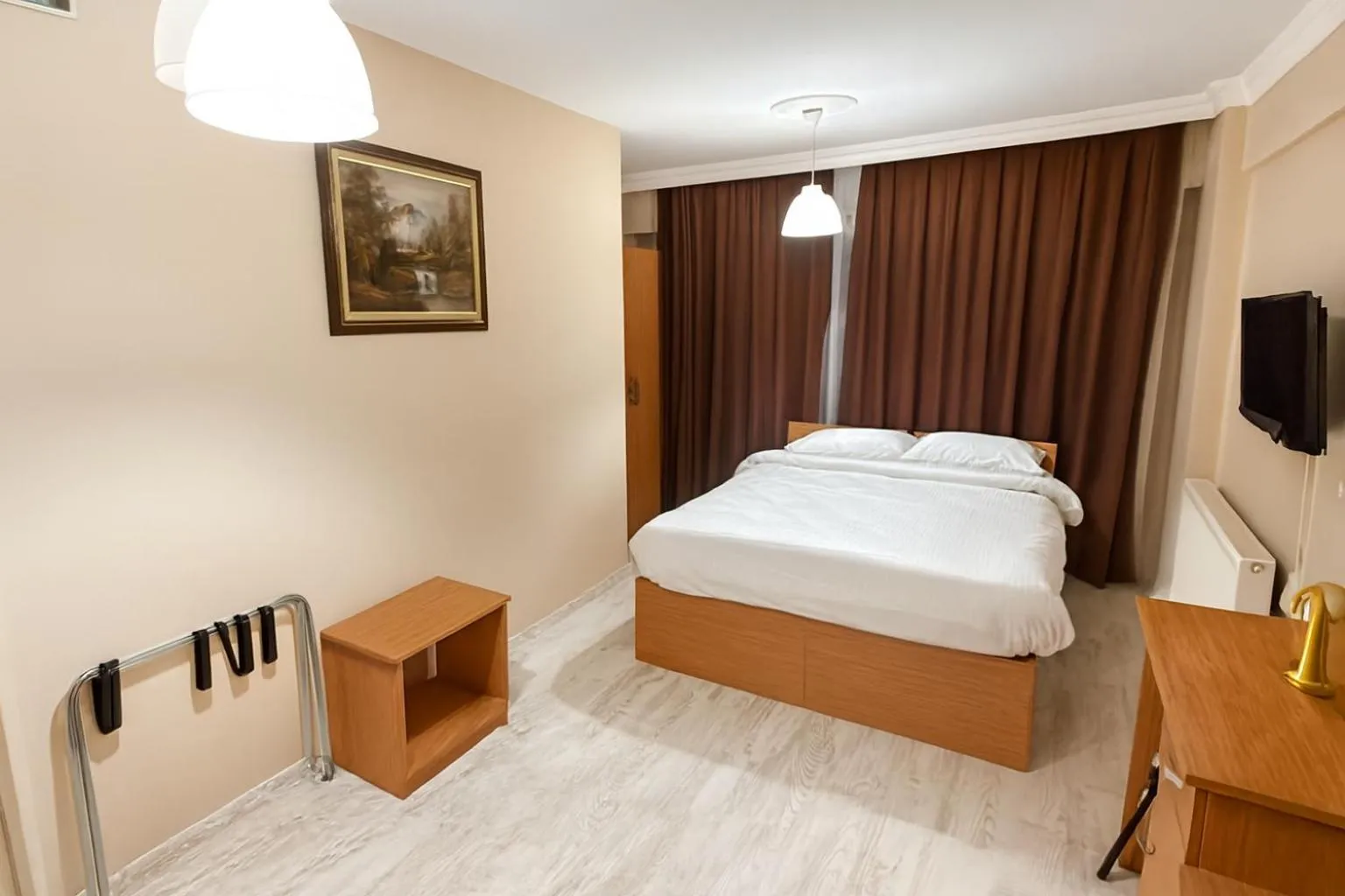 Bed in Lion Stone Hotel
