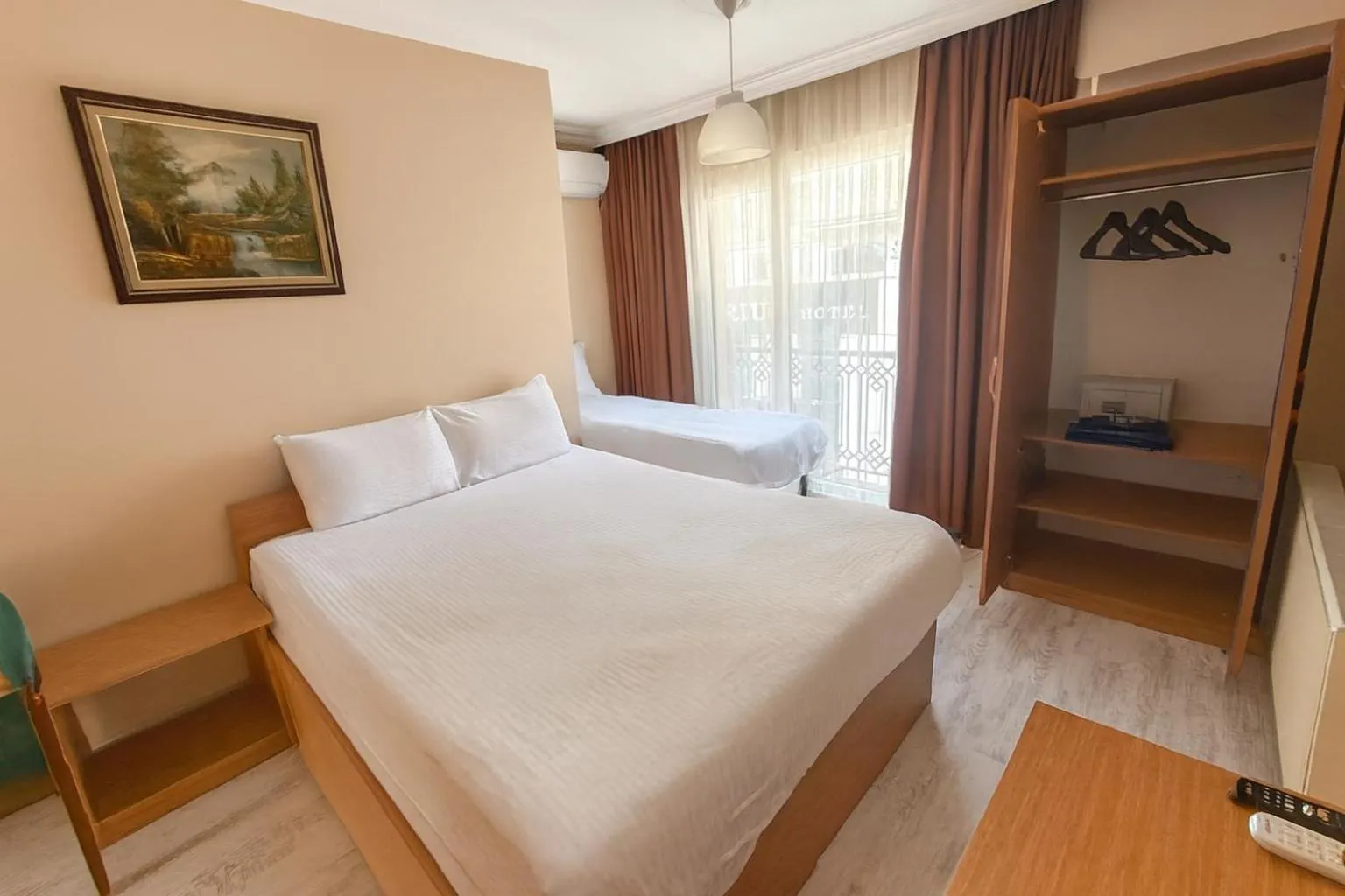 Bed in Lion Stone Hotel