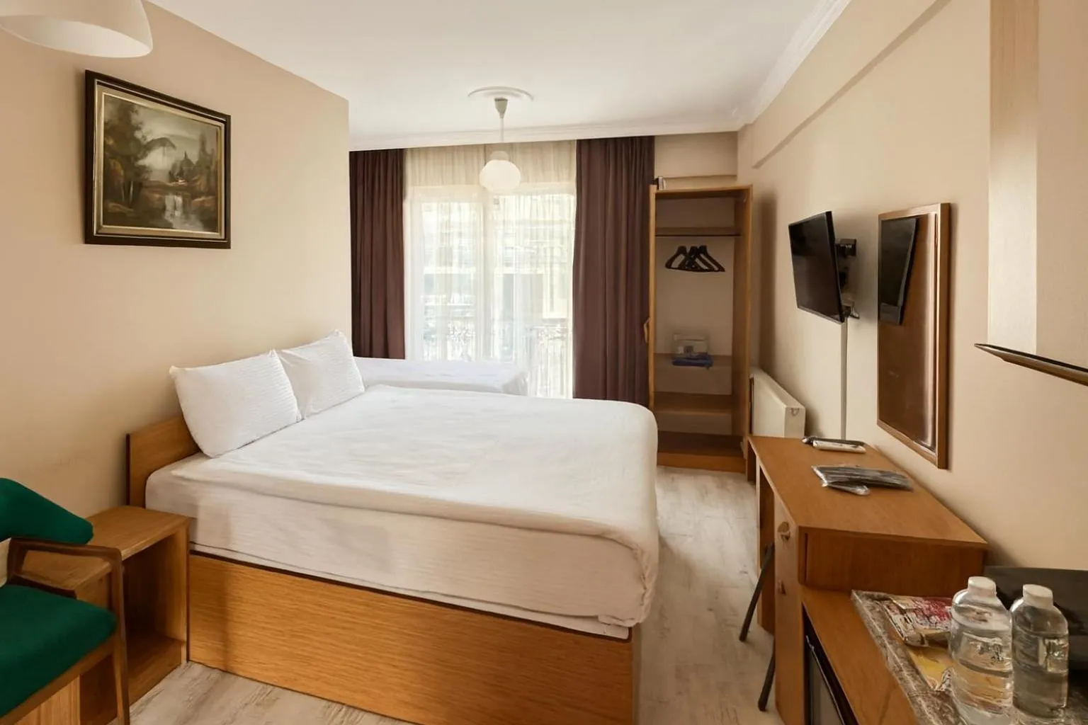 Bed in Lion Stone Hotel