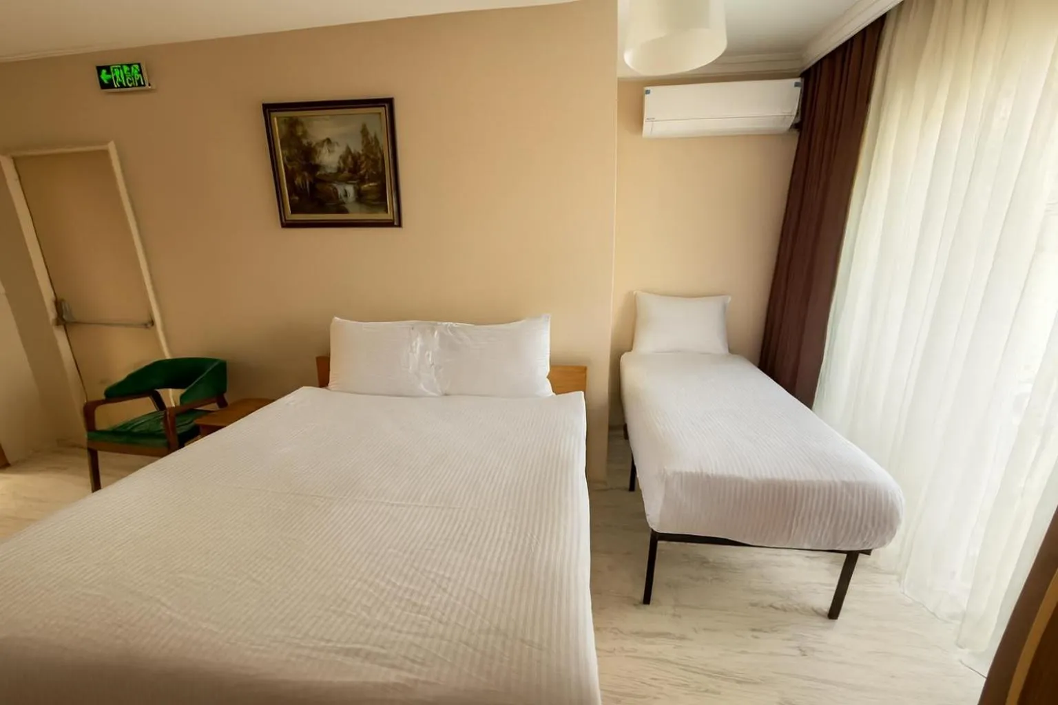 Bed in Lion Stone Hotel