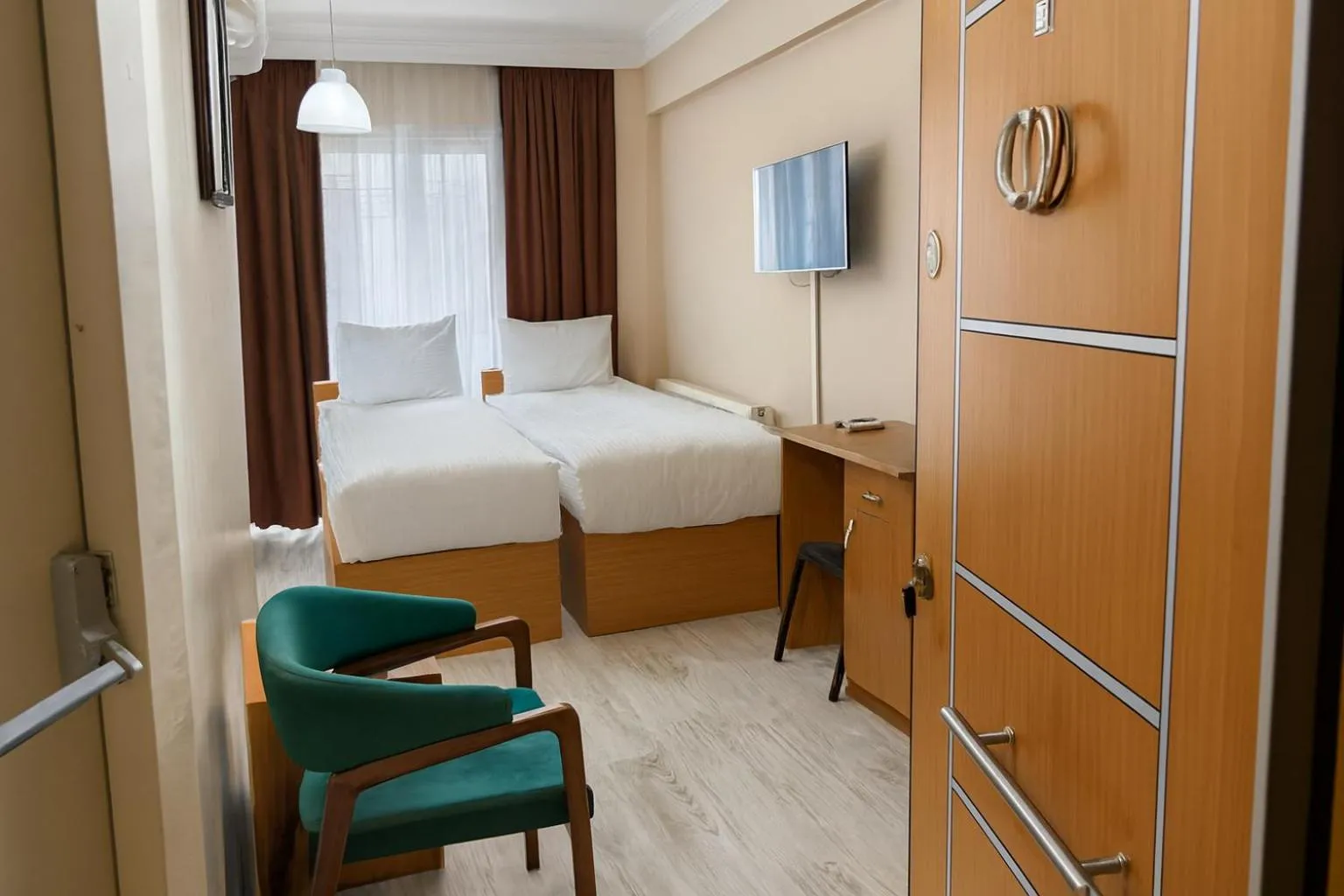 Bed in Lion Stone Hotel