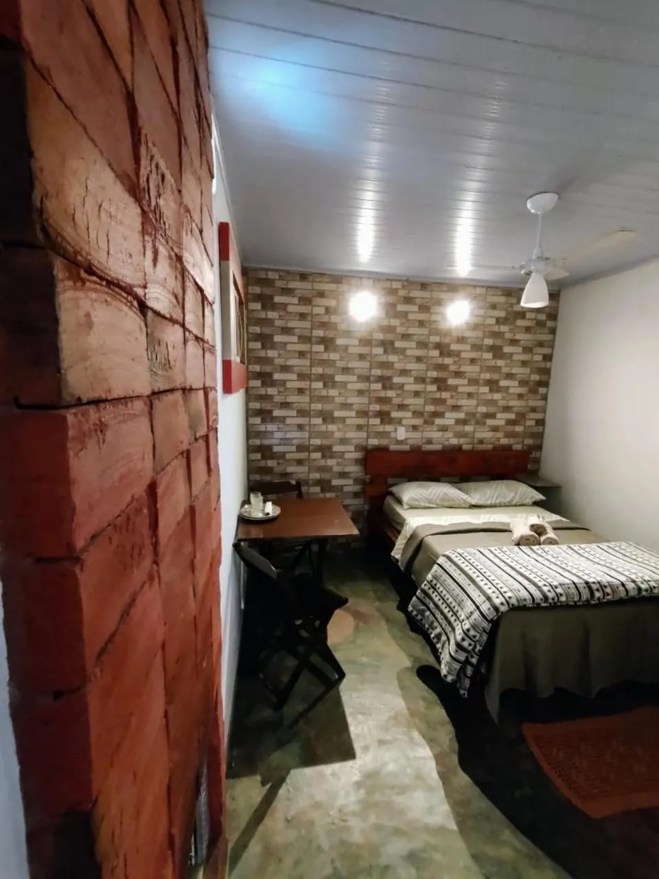 Bed in Pousada do Zezé