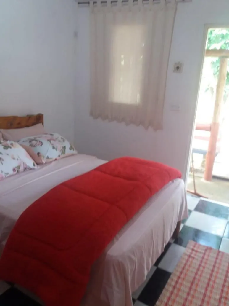 Bed in Pousada do Zezé