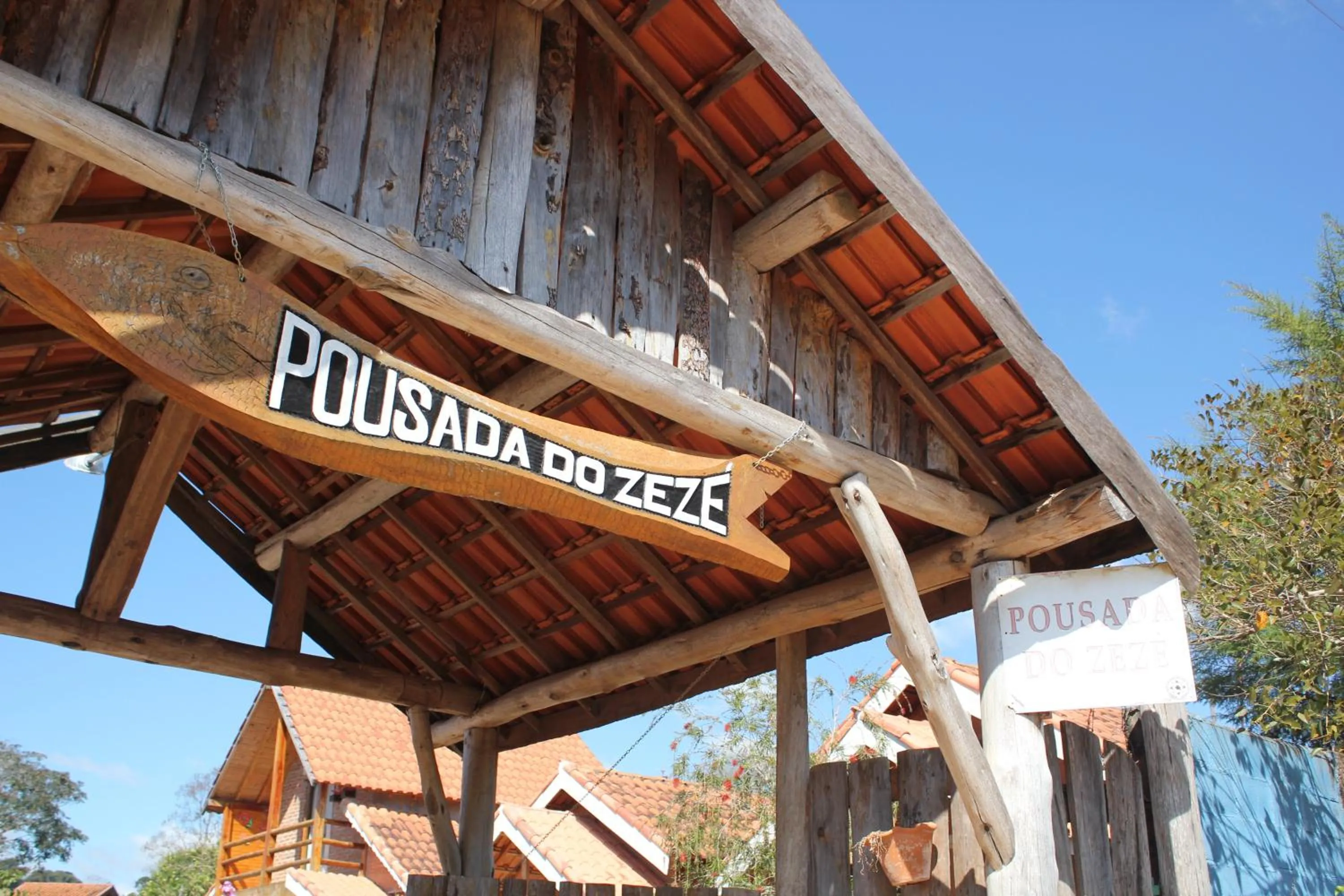 Property logo or sign in Pousada do Zezé