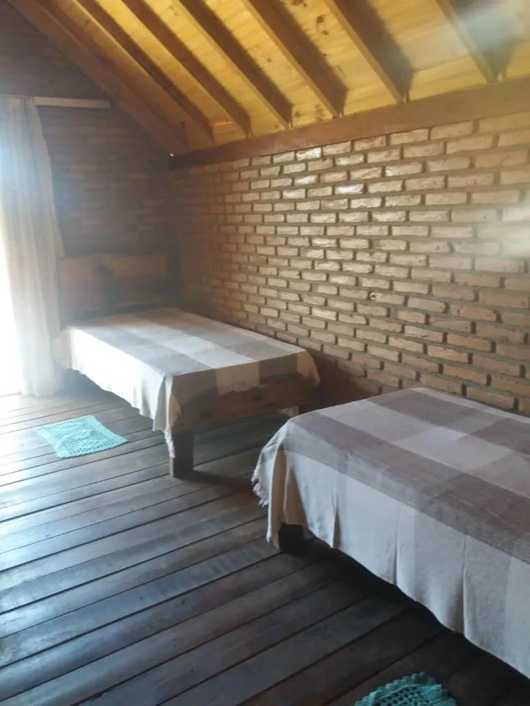 Bed in Pousada do Zezé