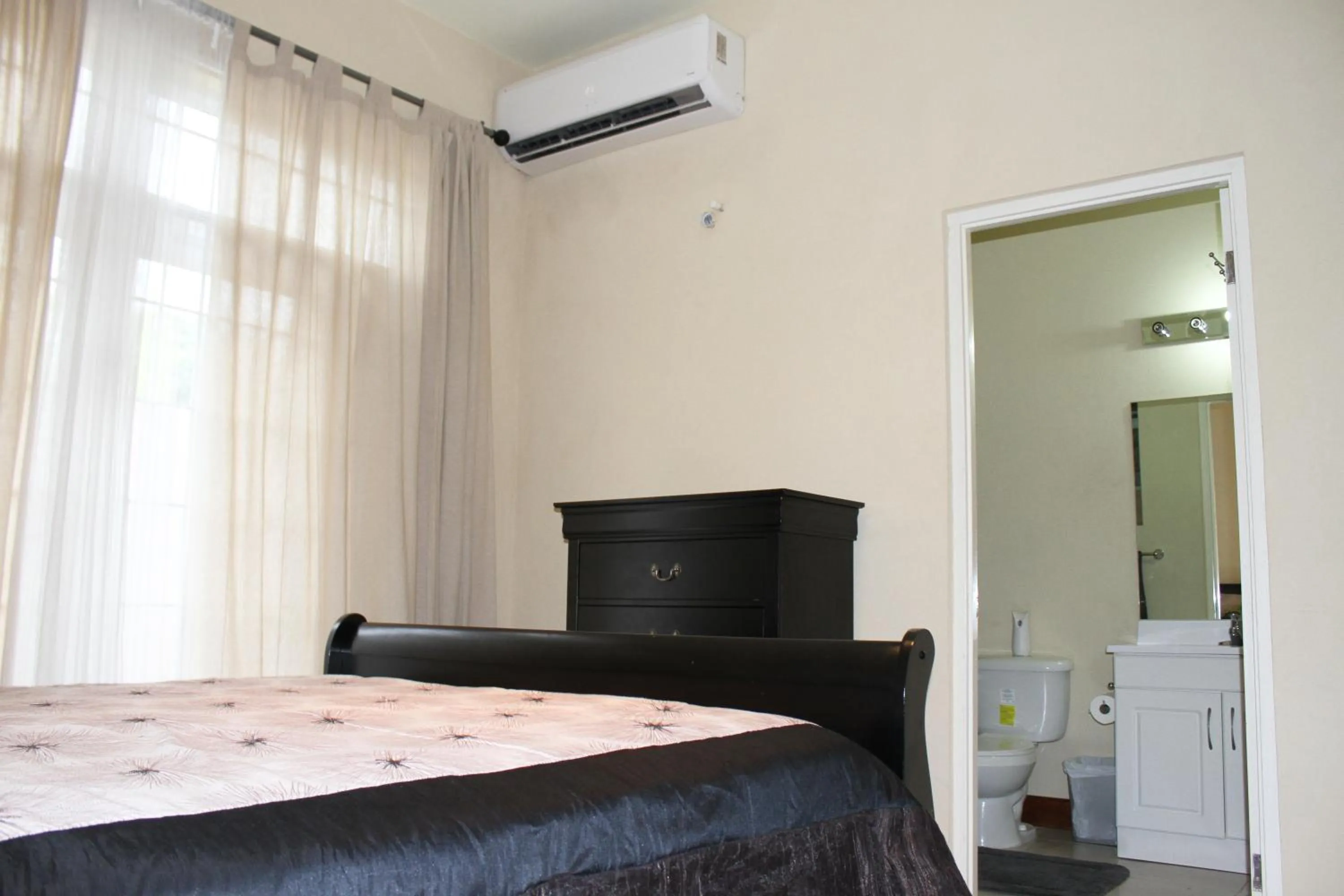 Bed in Eclipse Suite Guest Apartment