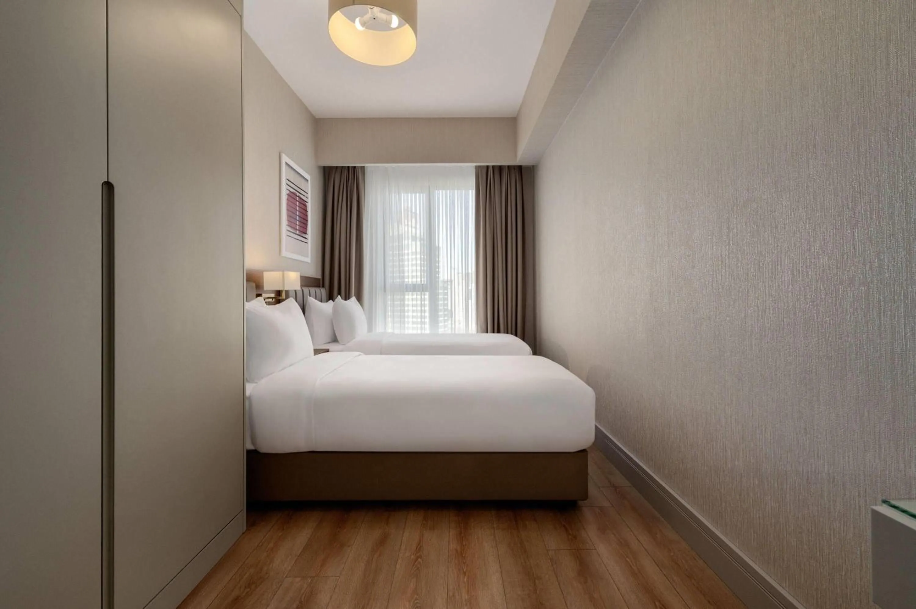 Three-Bedroom Family King Residence with Four Single Beds in Ramada Residences by Wyndham Istanbul Haramidere