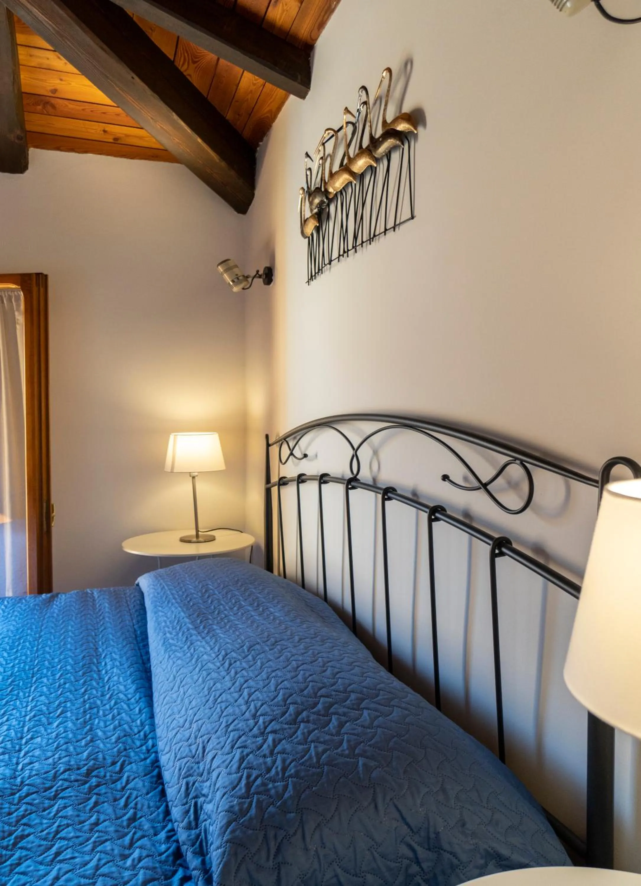 Bed in Residenza Ariosto Depandance by Studio Vita